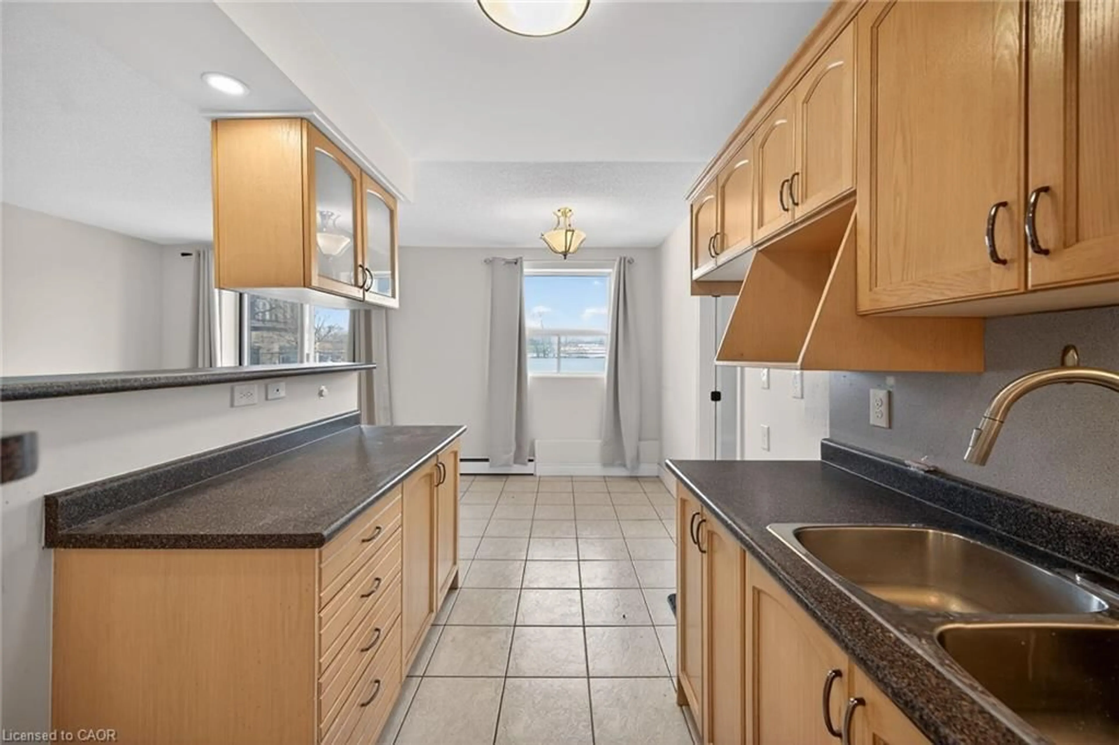 Standard kitchen, ceramic/tile floor for 851 Queenston Rd #204, Stoney Creek Ontario L8G 1B4
