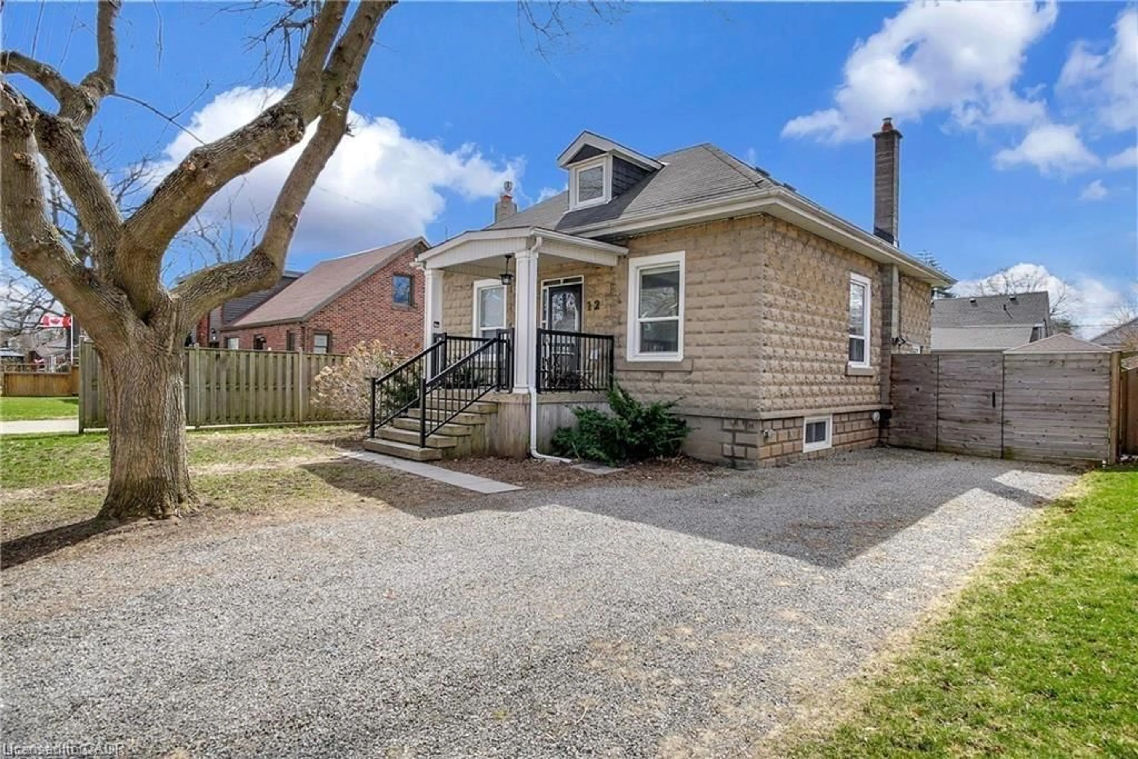 Home with brick exterior material, street for 12 Murdoch St, Cambridge Ontario N1R 4H4