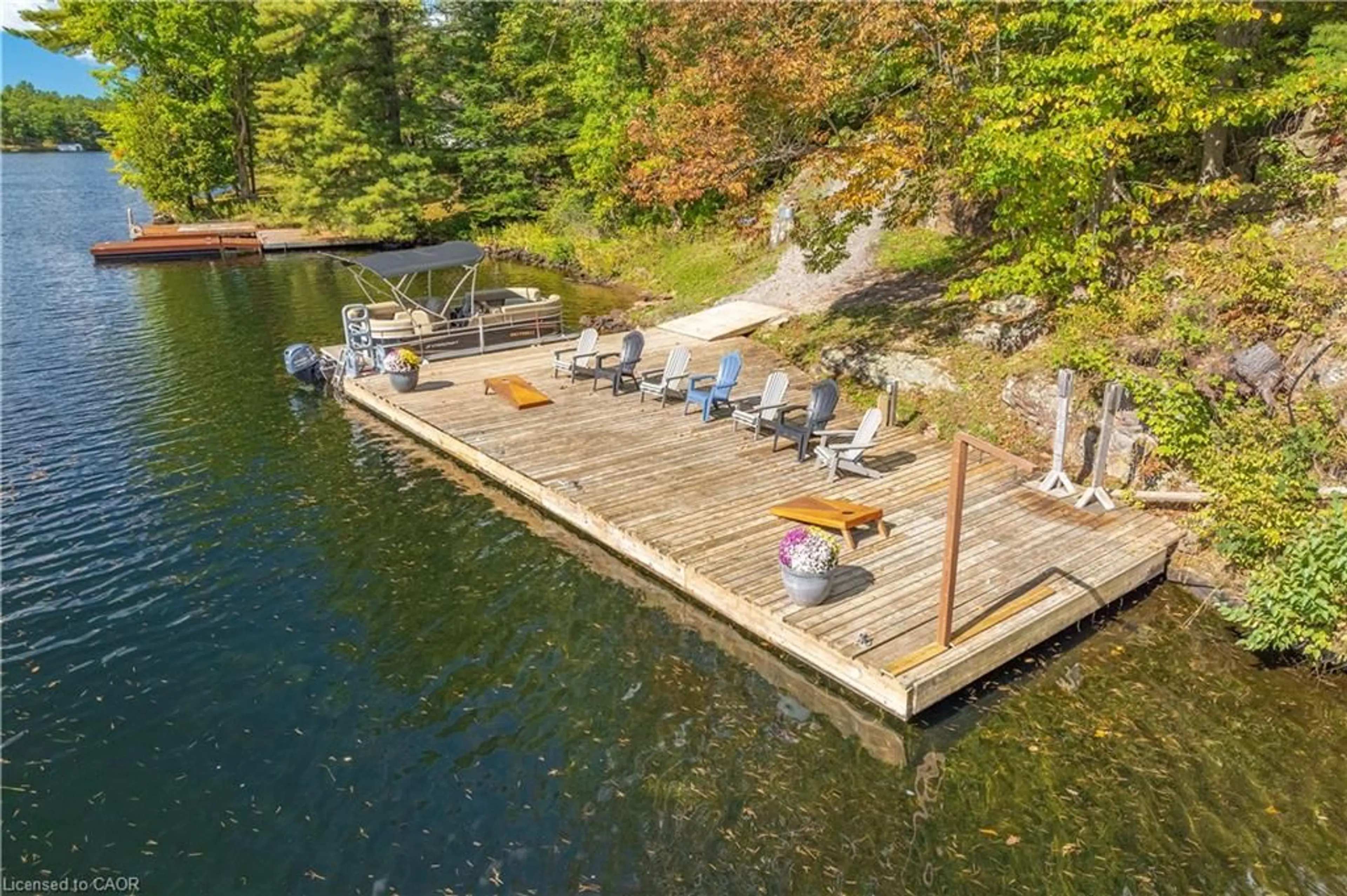 A pic from outside/outdoor area/front of a property/back of a property/a pic from drone, water/lake/river/ocean view for 49 Severn River Sr405, Muskoka Lakes Ontario Z1Z 1Z1