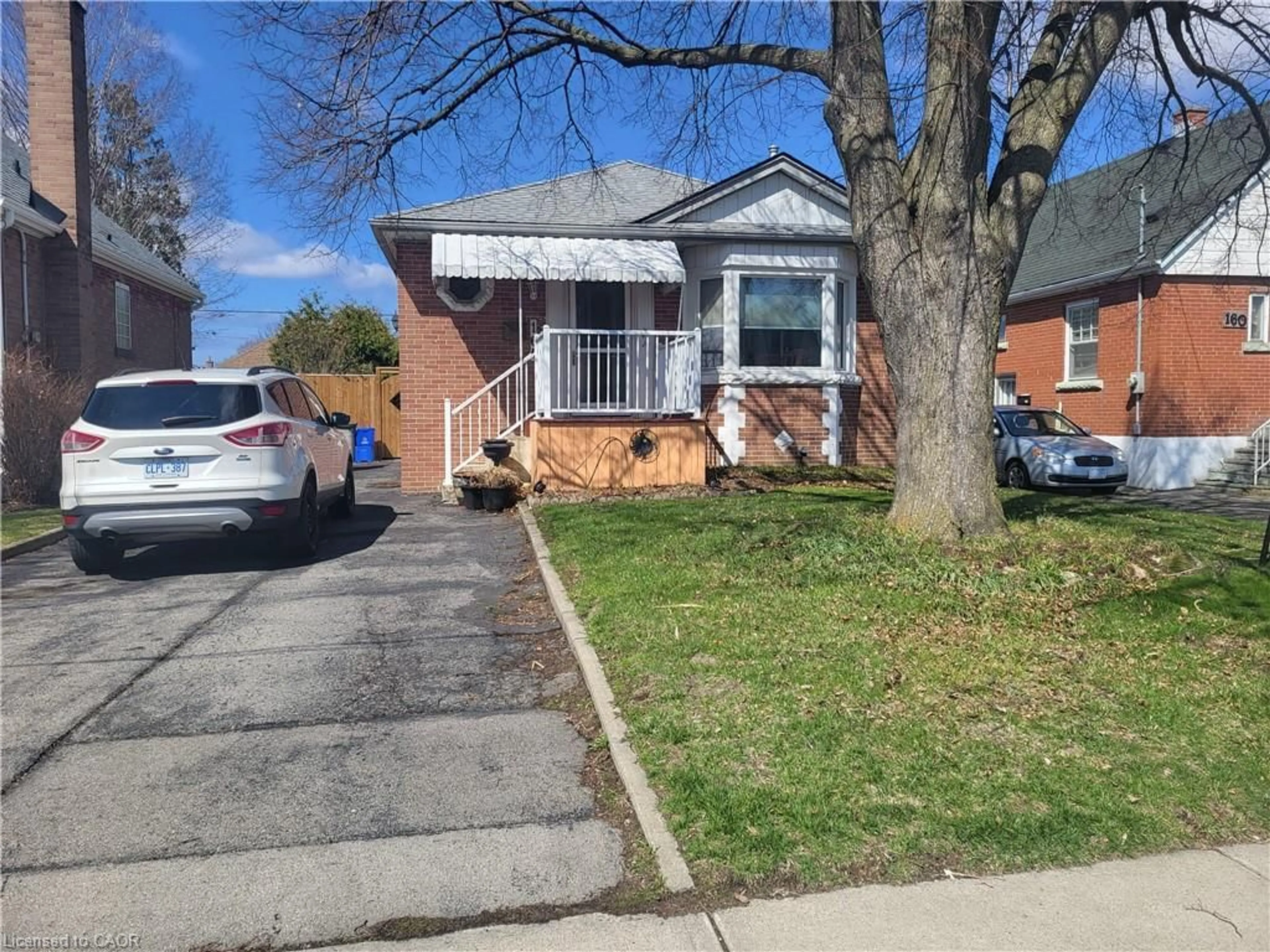 Home with brick exterior material, street for 164 Taylor Ave, Hamilton Ontario L8K 3T2