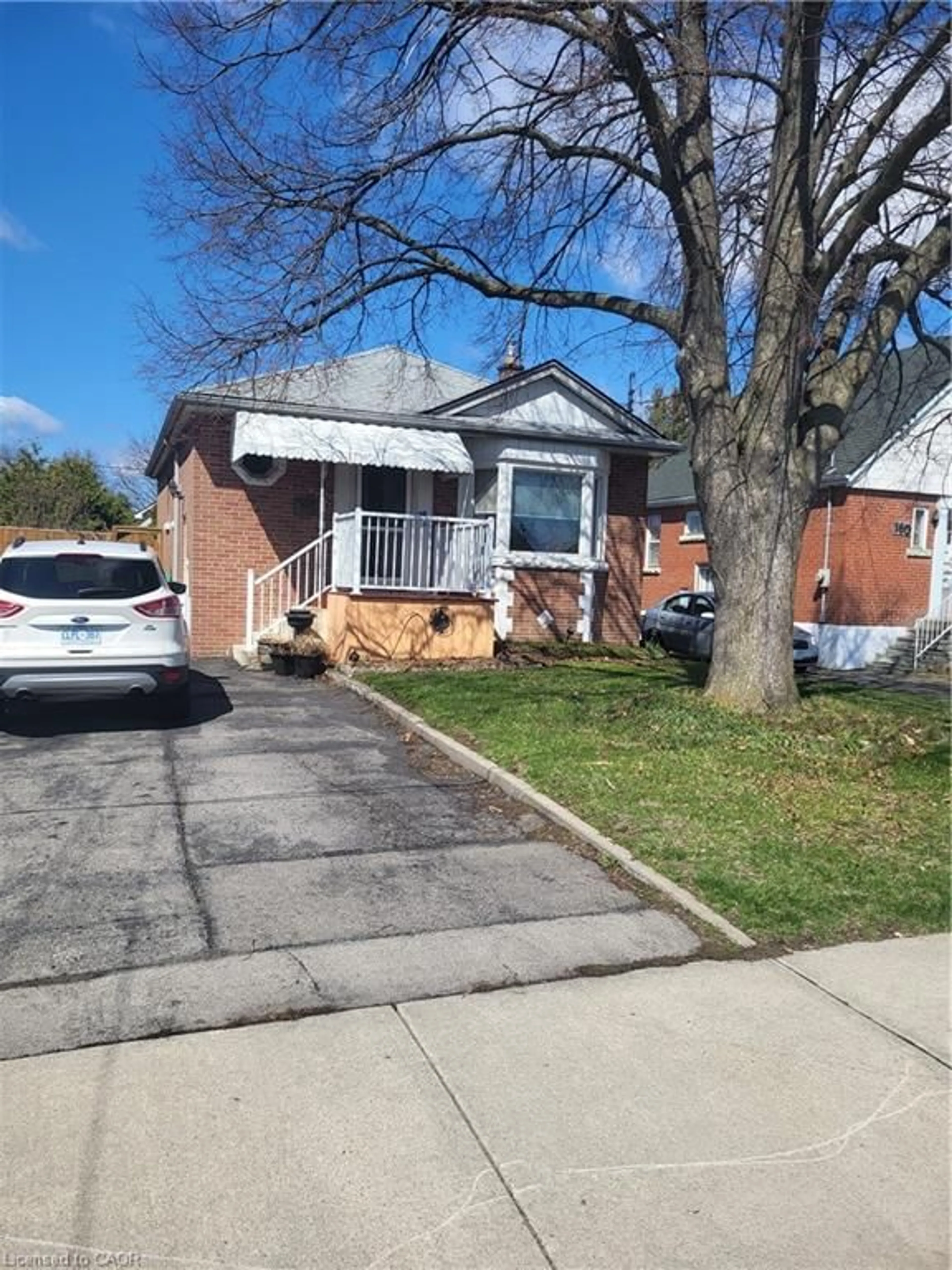 Home with brick exterior material, street for 164 Taylor Ave, Hamilton Ontario L8K 3T2