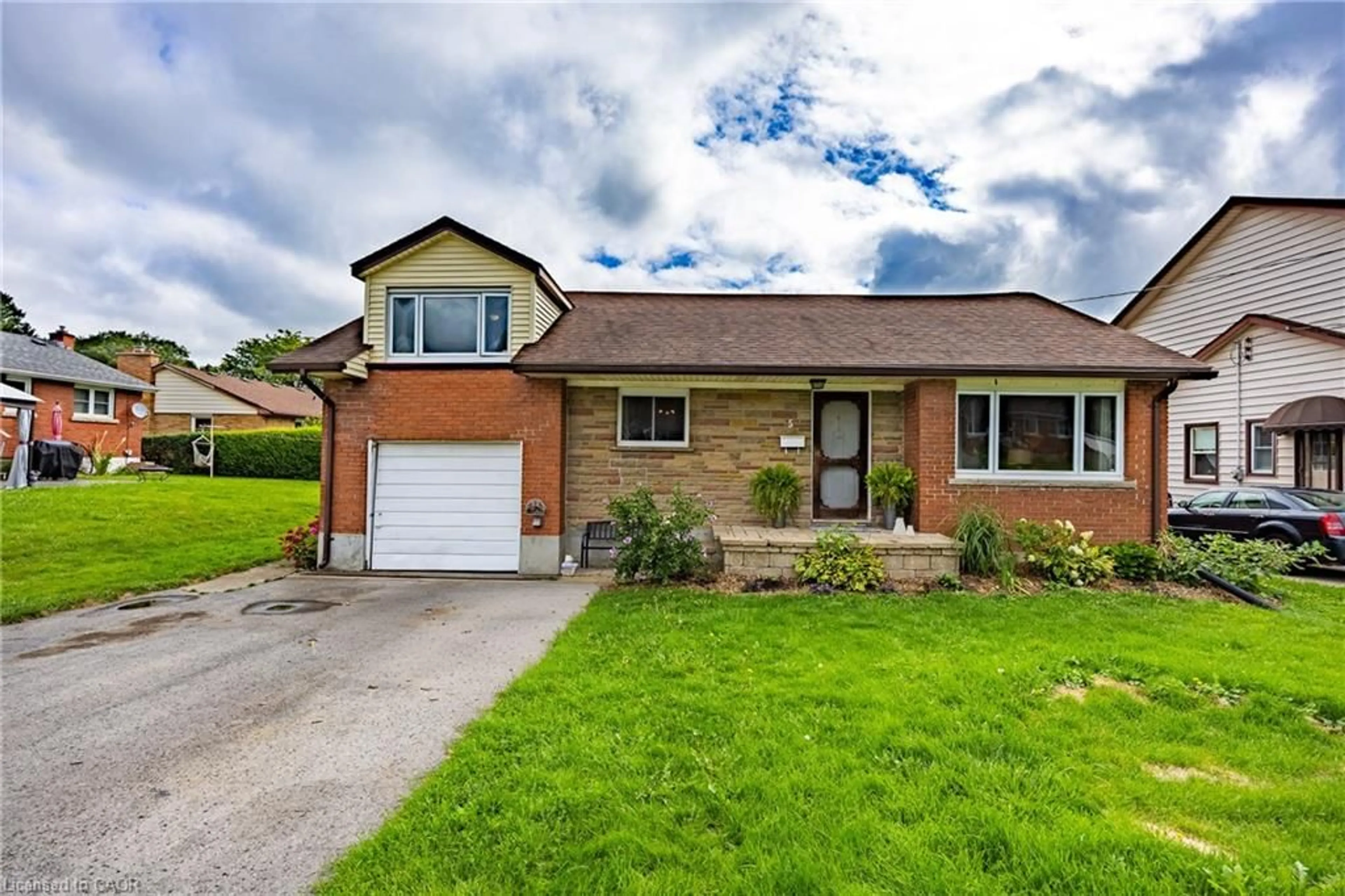 Home with brick exterior material, street for 5 Bint Ave, Simcoe Ontario N3Y 4J4