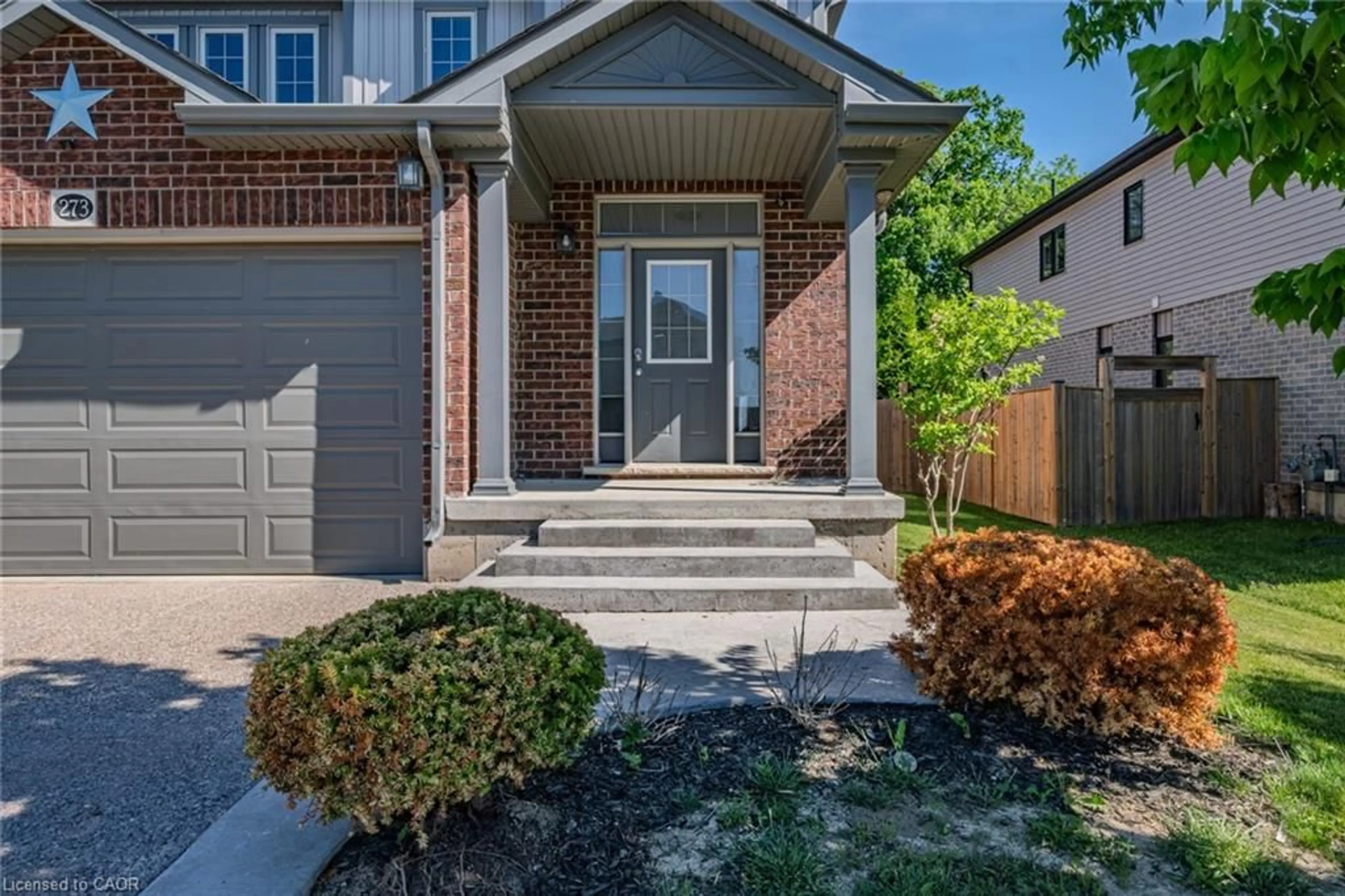 Home with brick exterior material, street for 273 Woodway Trail, Simcoe Ontario N3Y 0C9