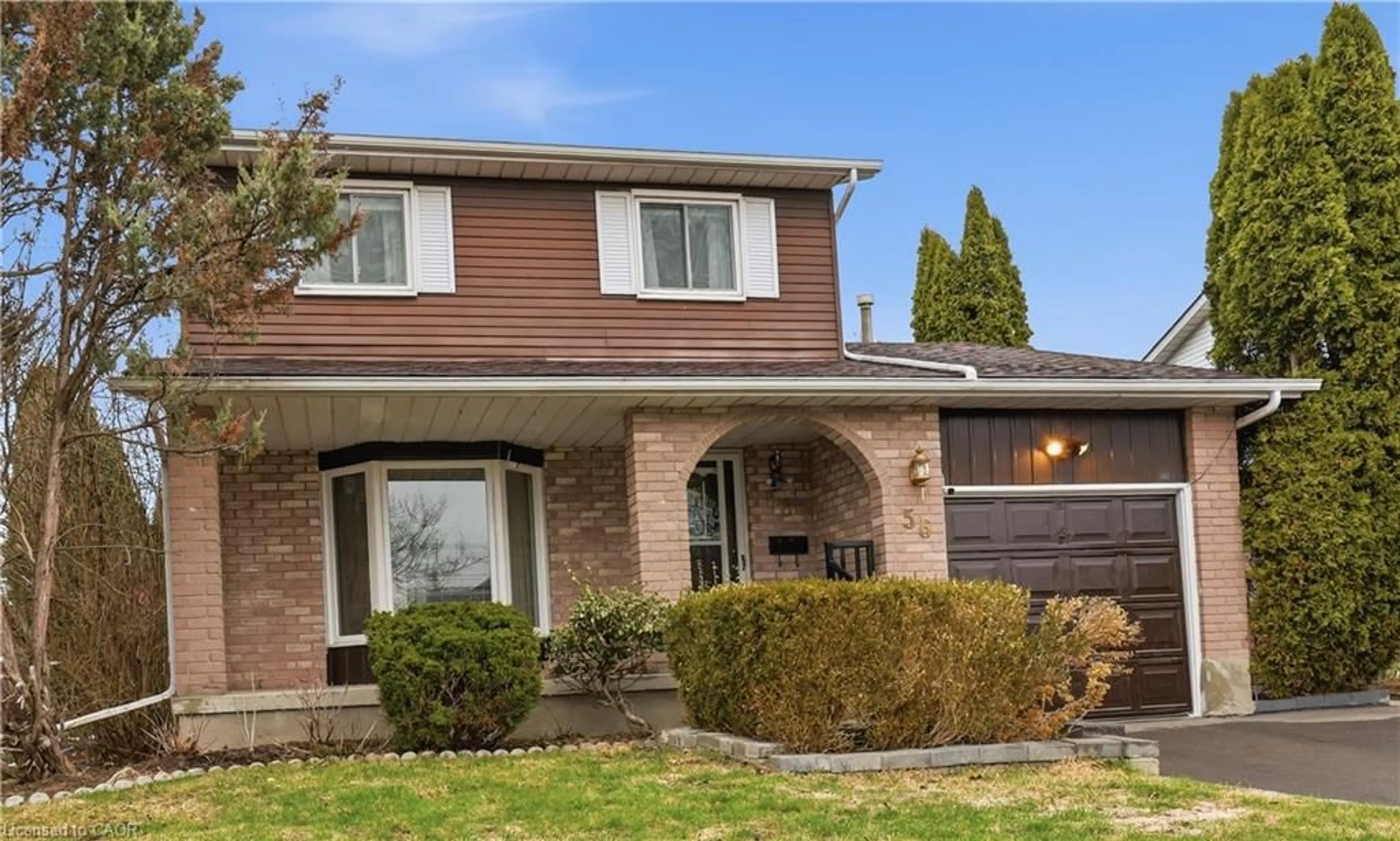 Home with brick exterior material, street for 56 Rushbrook Dr, Kitchener Ontario N2E 3C9