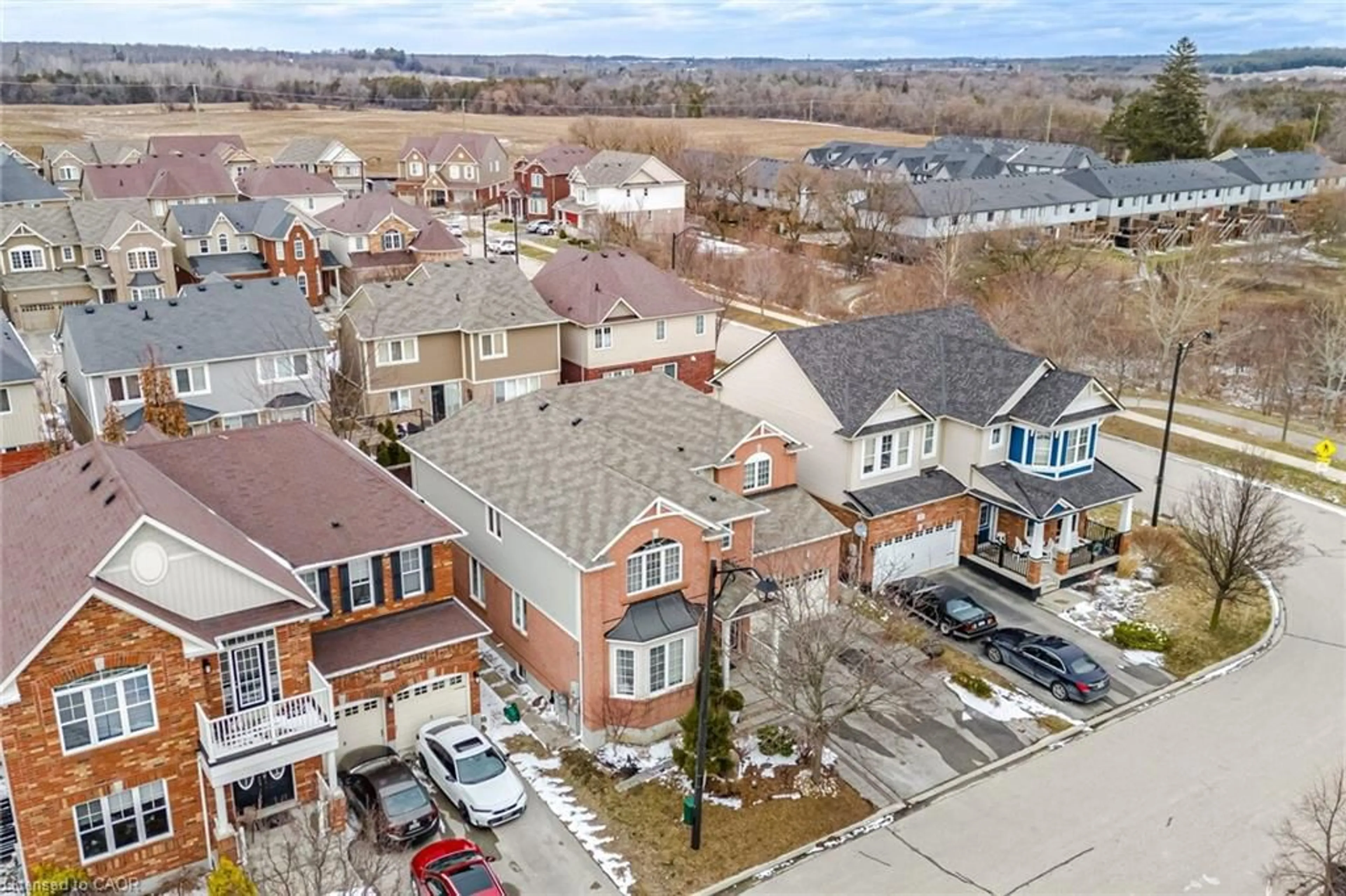 A pic from outside/outdoor area/front of a property/back of a property/a pic from drone, street for 59 Apple Dr, Cambridge Ontario N3C 0E7