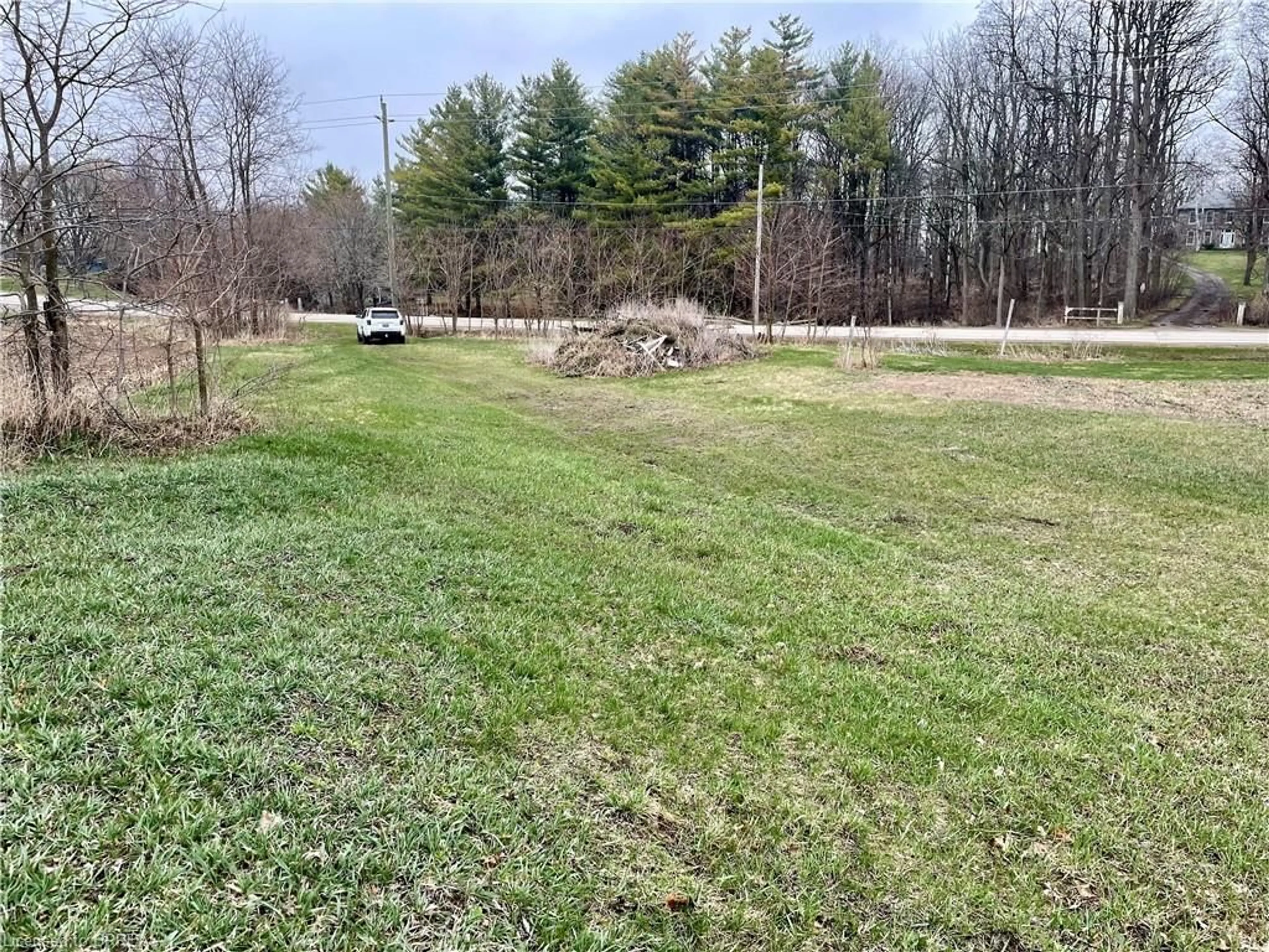 A pic from outside/outdoor area/front of a property/back of a property/a pic from drone, forest/trees view for 161 Pleasant Ridge Rd, Brantford Ontario N3R 0B8