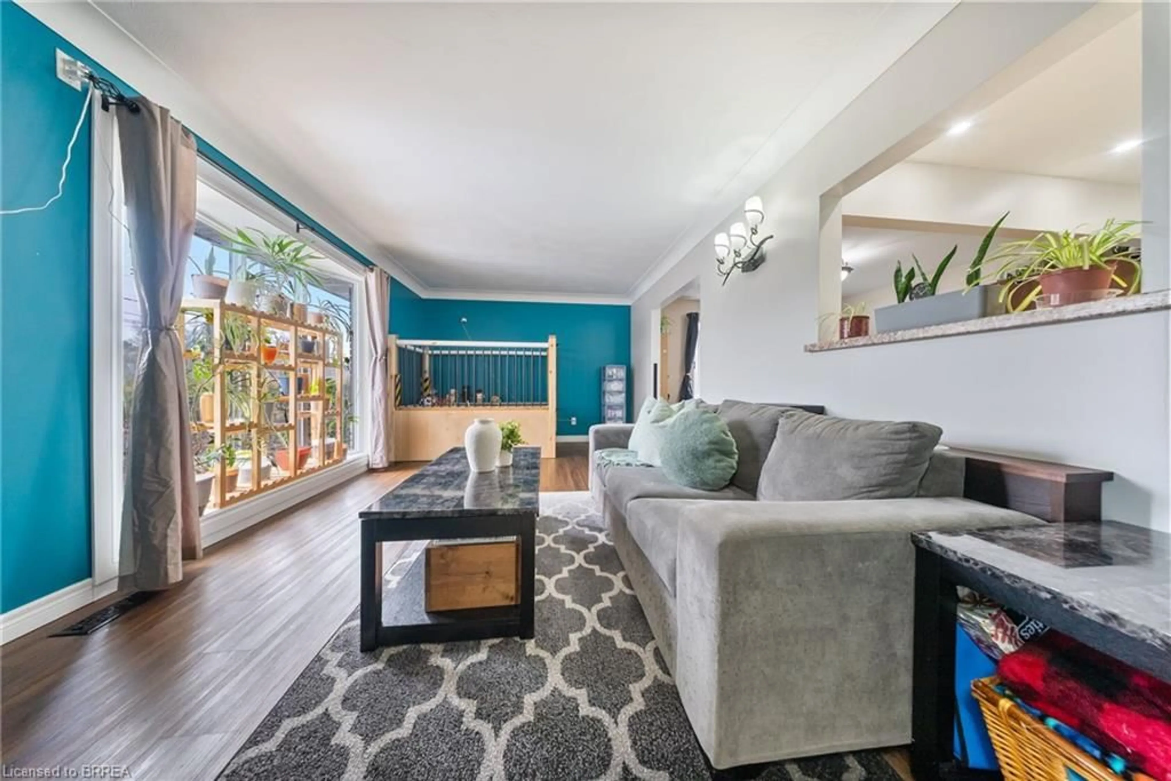 Living room with furniture, unknown for 12 Paris Rd, Brantford Ontario N3R 1H7