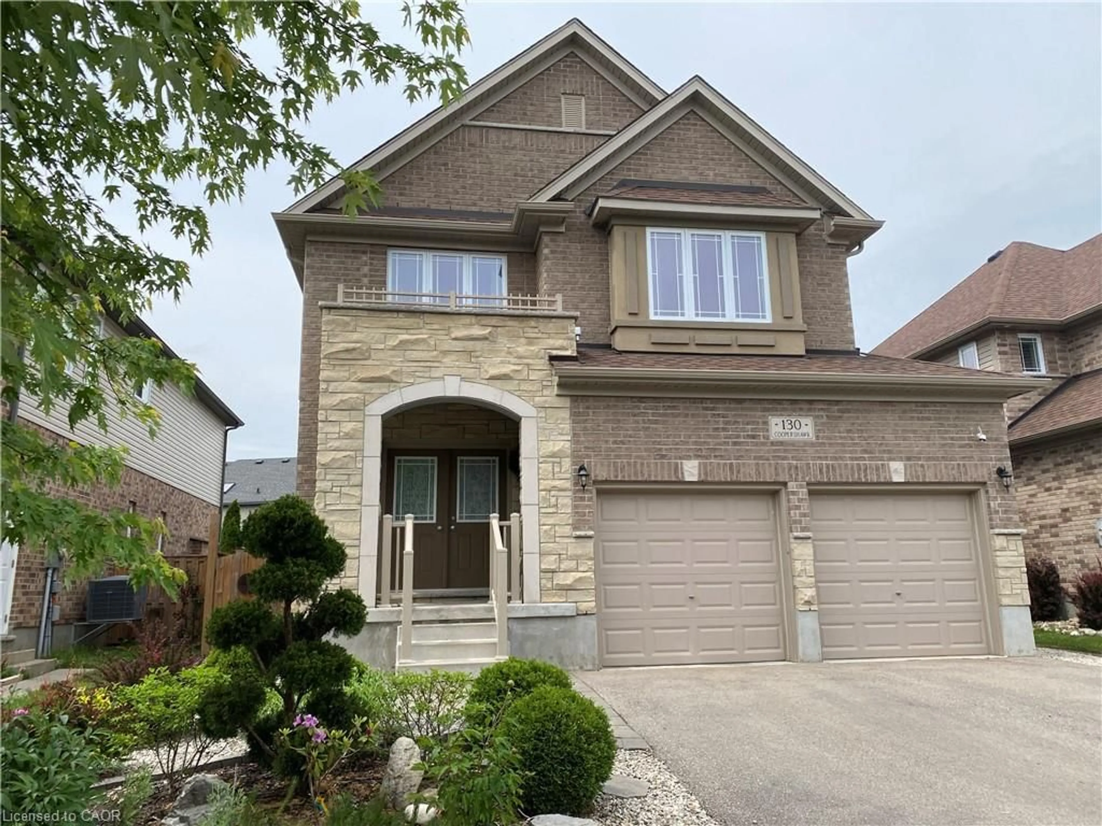 Home with brick exterior material, street for 130 Coopershawk St, Kitchener Ontario N2K 4J3