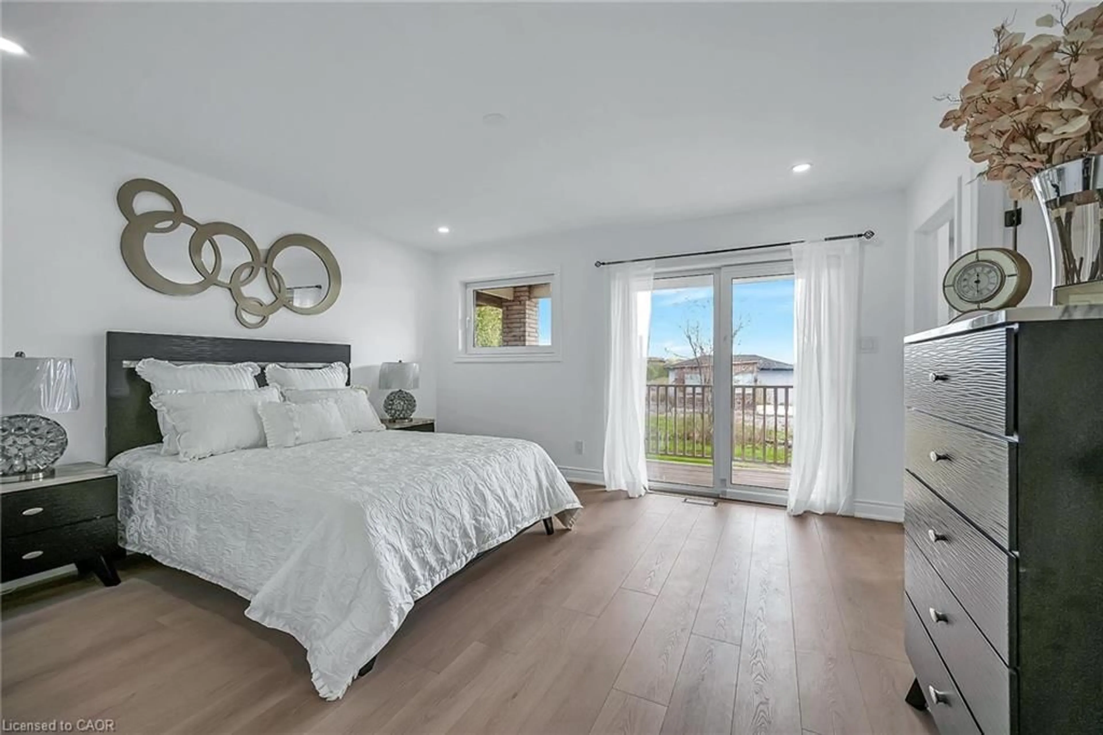 Bedroom with bed, wood/laminate floor for 120 Second Rd, Stoney Creek Ontario L8J 3J2