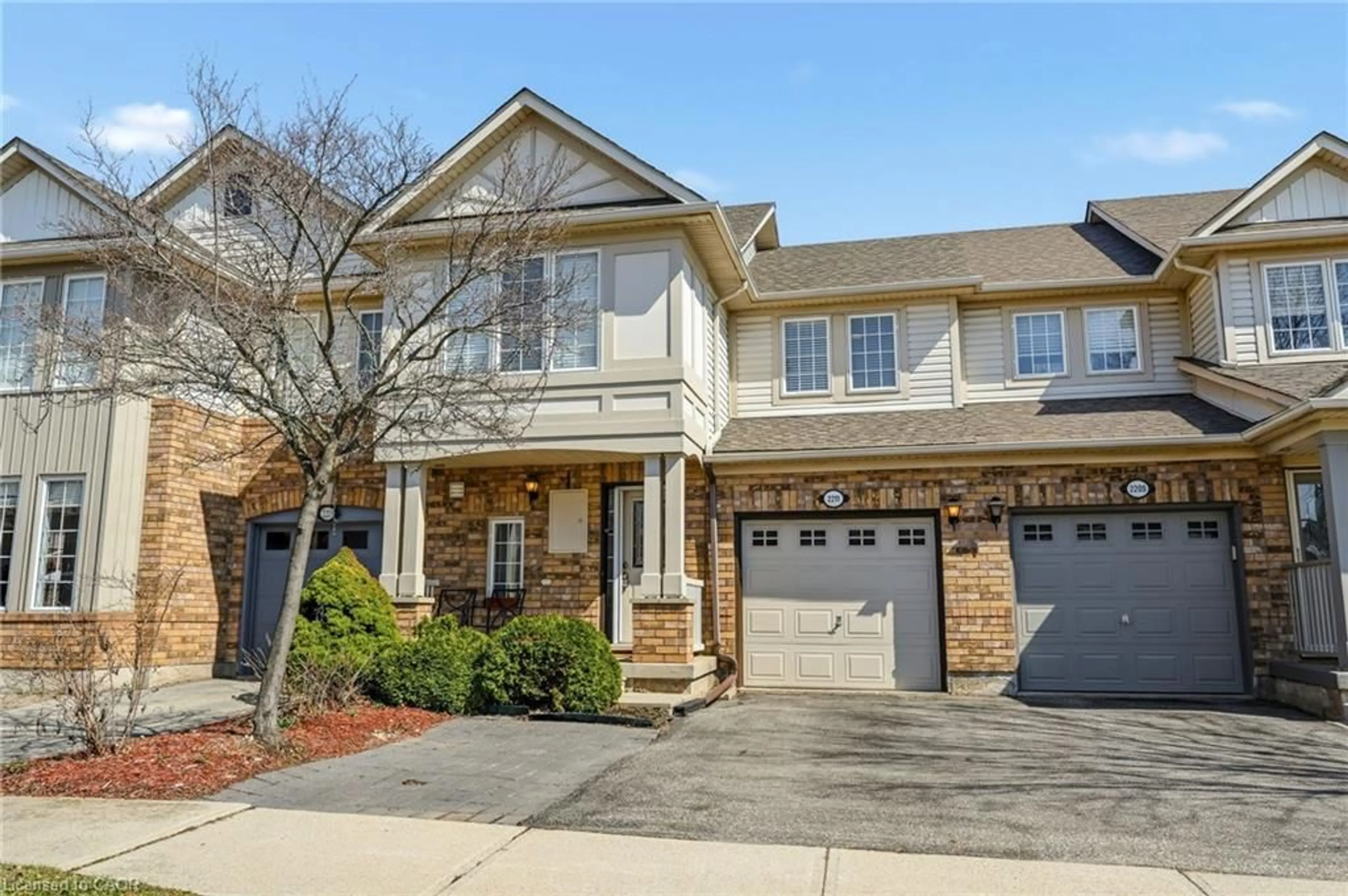 Home with brick exterior material, street for 2211 Amberglen Crt, Oakville Ontario L6M 4W8