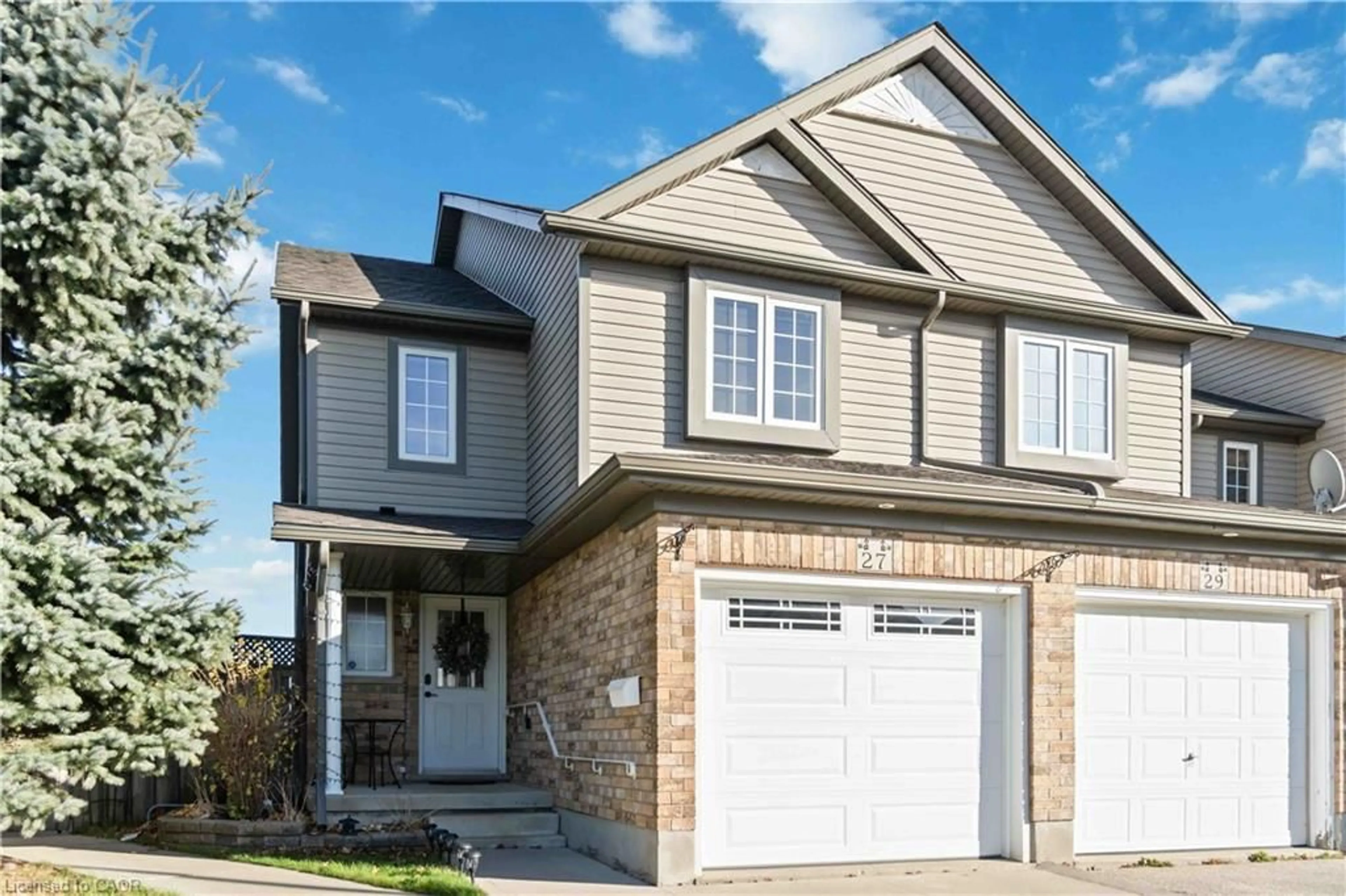 Home with brick exterior material, street for 27 Red Clover Cres, Kitchener Ontario N2E 4G8