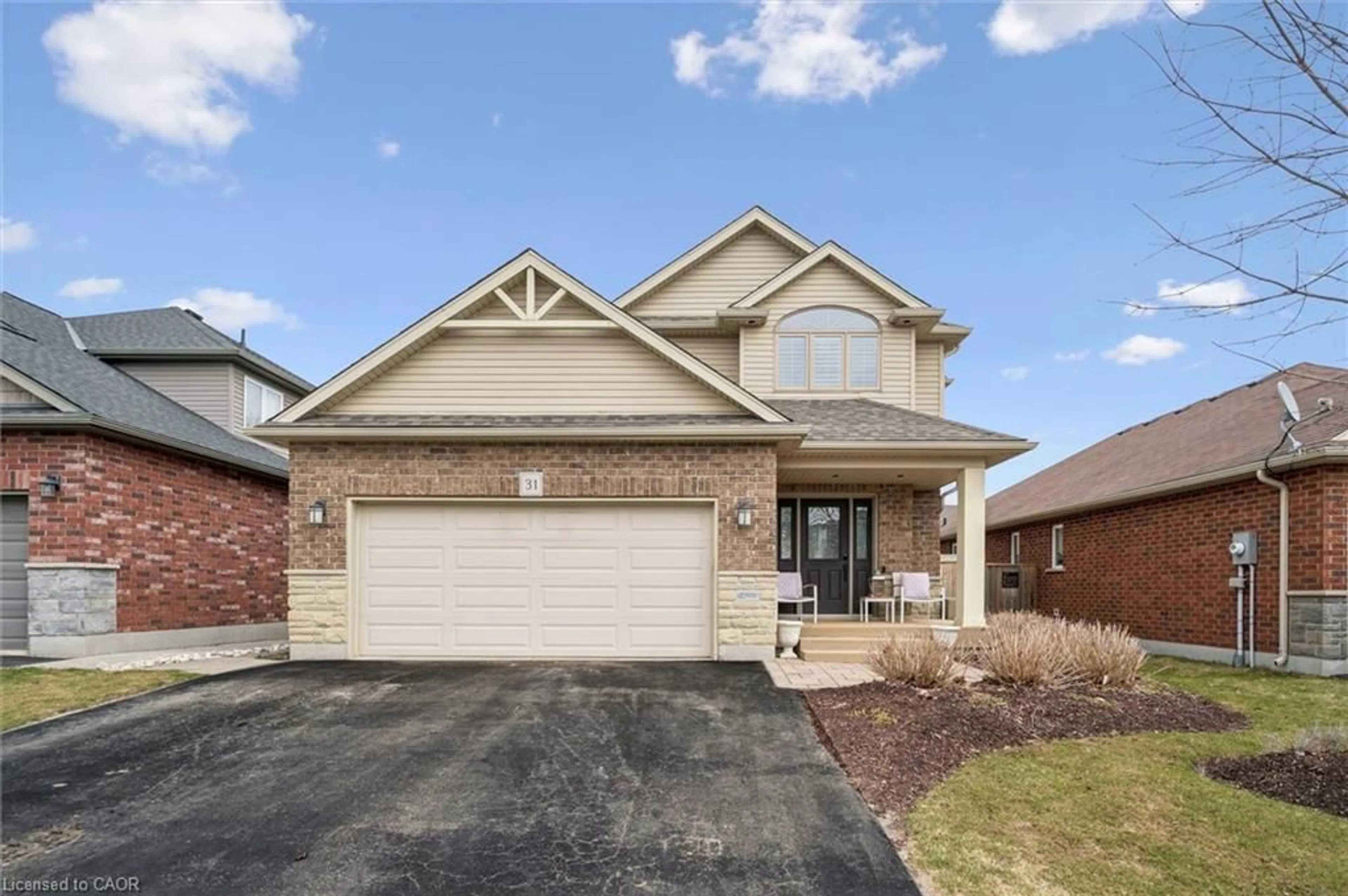 Home with brick exterior material, street for 31 Healey St, Elora Ontario N0B 1S0