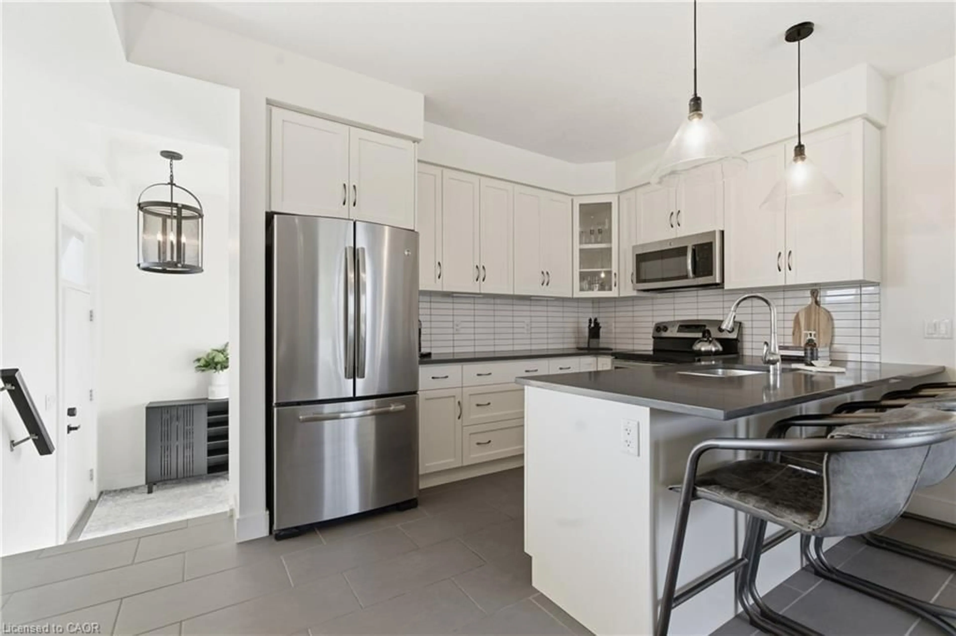 Open concept kitchen, ceramic/tile floor for 32 Arkell Rd #14, Guelph Ontario N1L 0L4