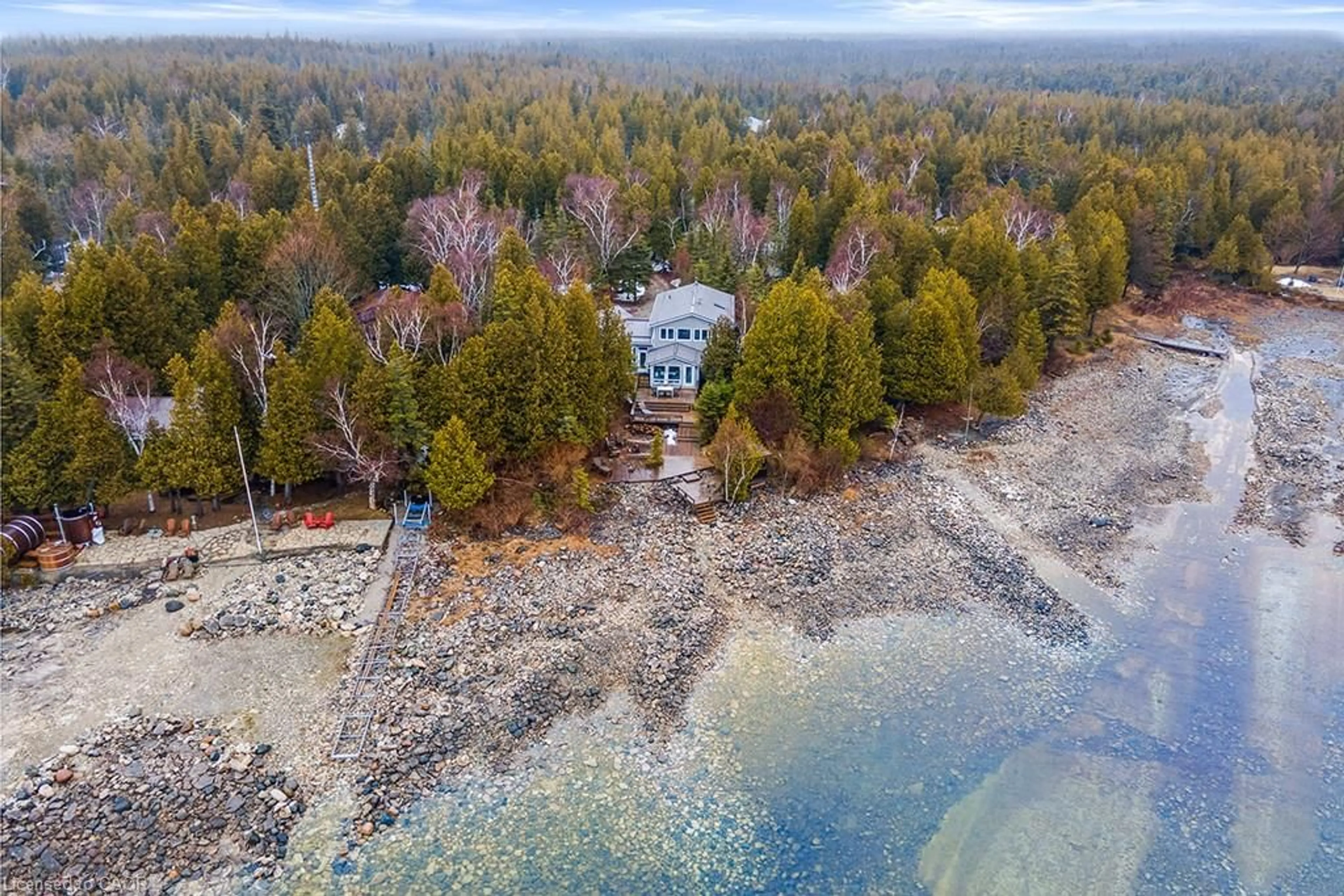 A pic from outside/outdoor area/front of a property/back of a property/a pic from drone, water/lake/river/ocean view for 1166 Dorcas Bay Rd, Tobermory Ontario N0H 2R0
