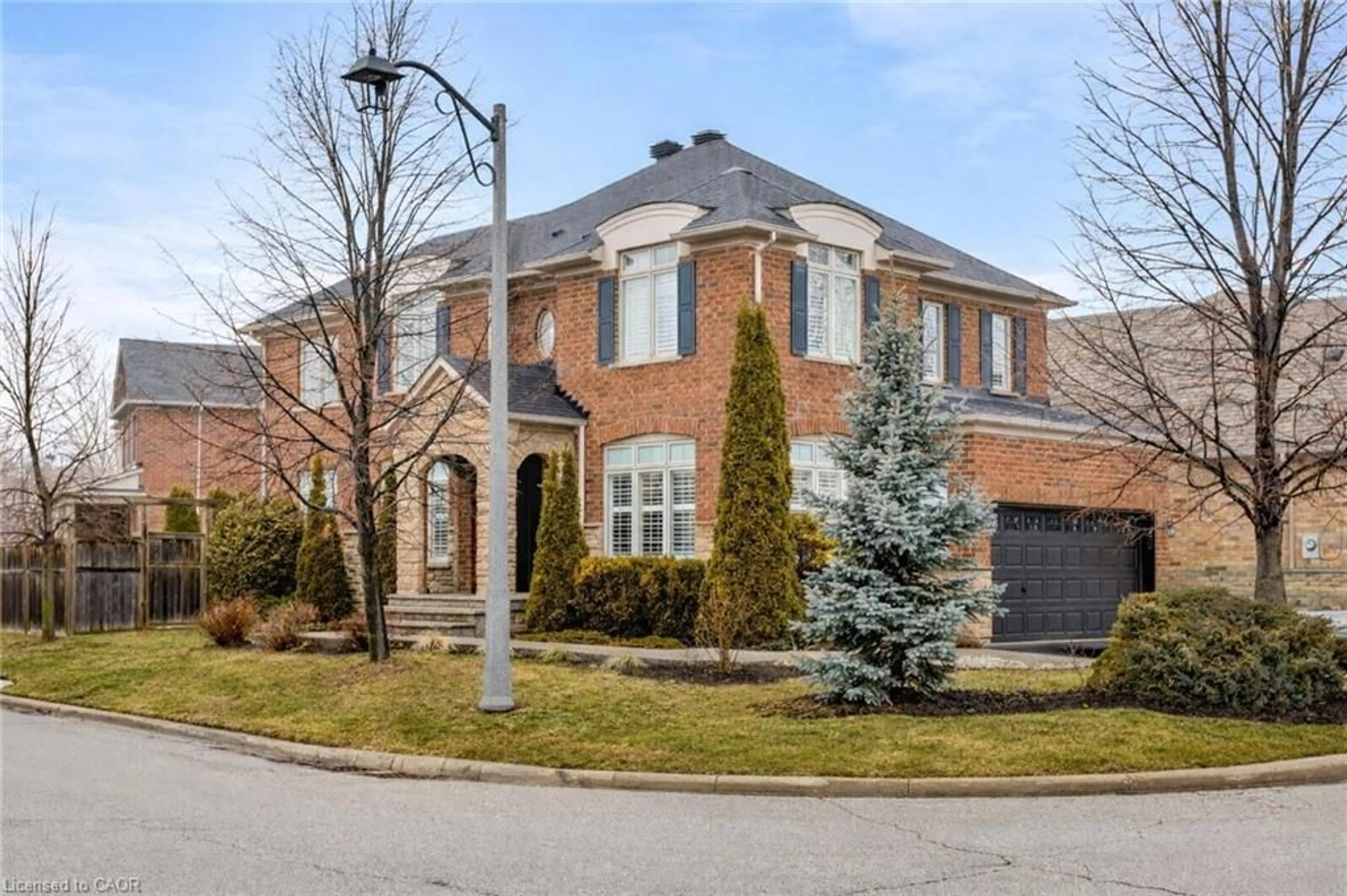 Home with brick exterior material, street for 2213 Littondale Lane, Oakville Ontario L6M 0B7