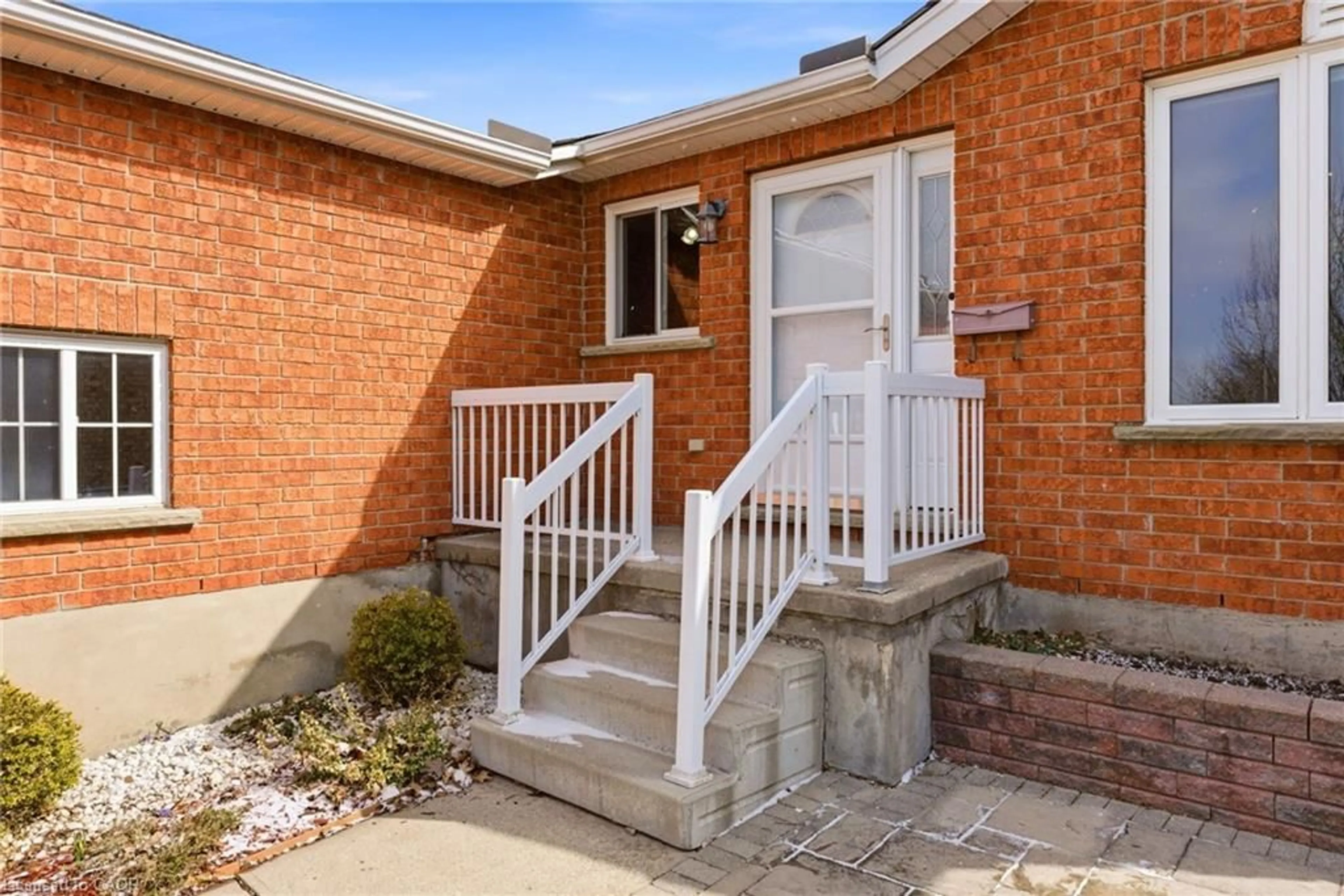 Home with brick exterior material, street for 135 Stirling Macgregor Dr, Cambridge Ontario N1S 5A1