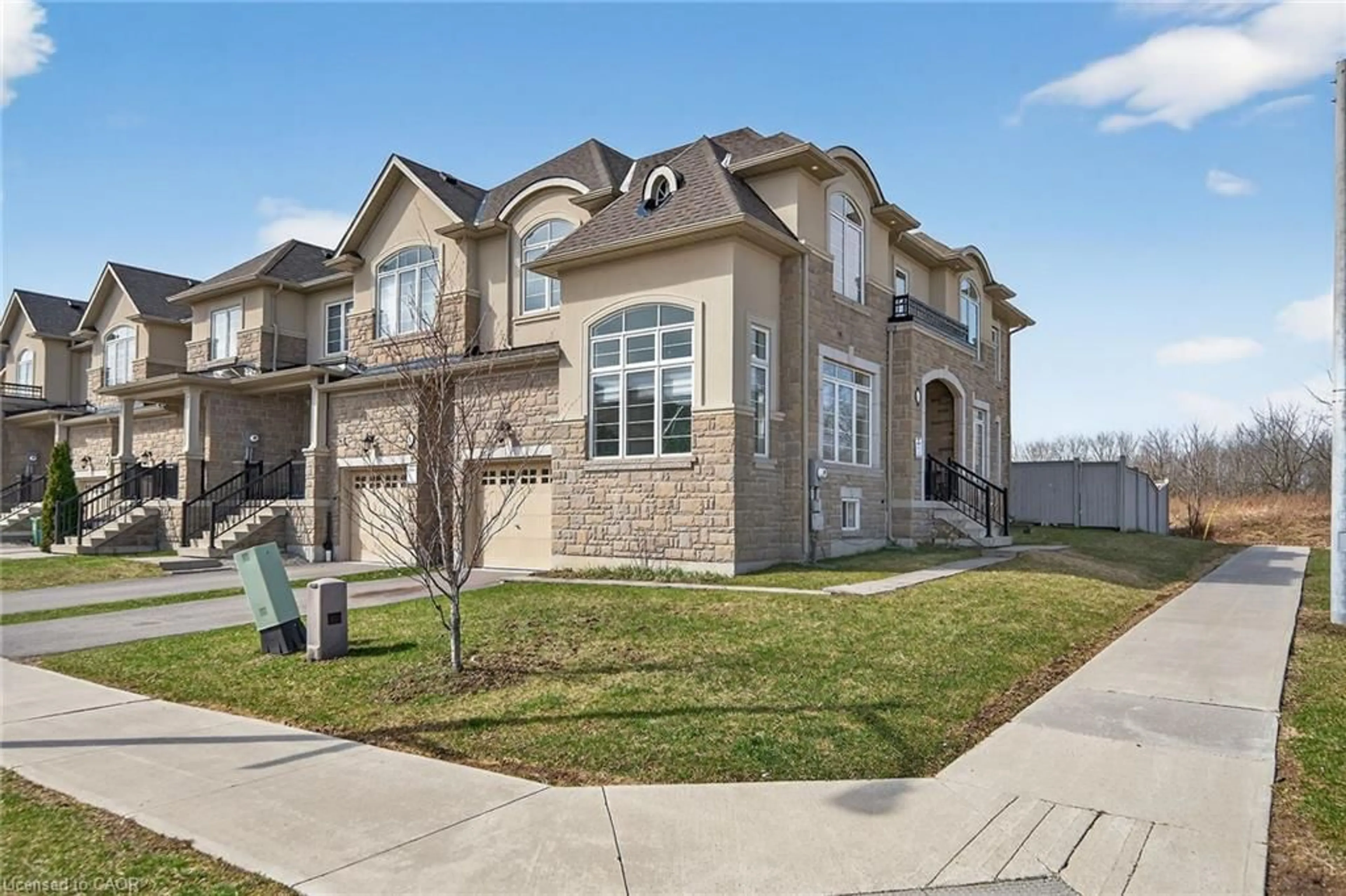 Home with brick exterior material, street for 140 Robertson Rd, Ancaster Ontario L9K 0J7