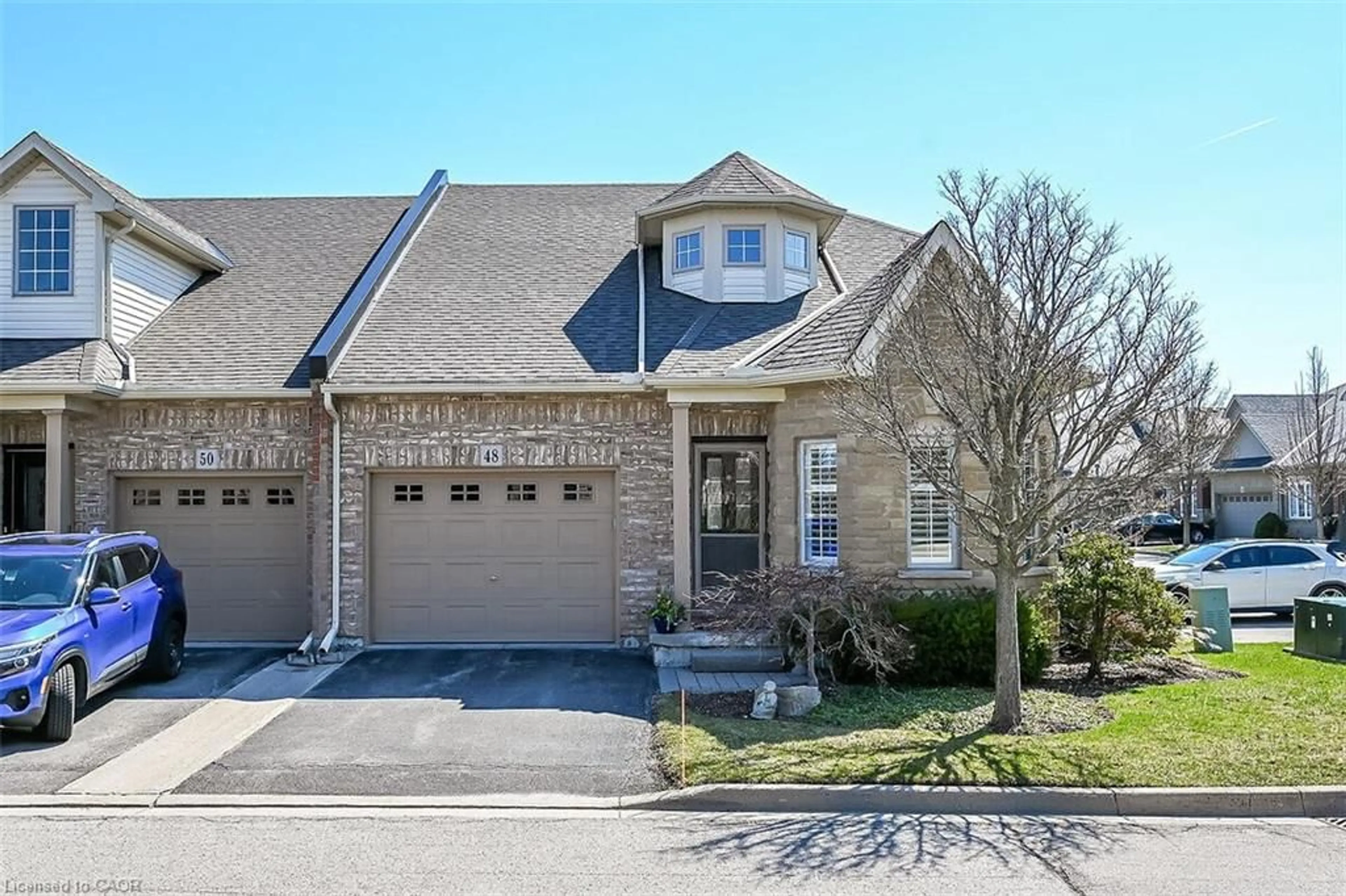 Home with brick exterior material, street for 48 Hallmark Trail, Hamilton Ontario L9B 0B8