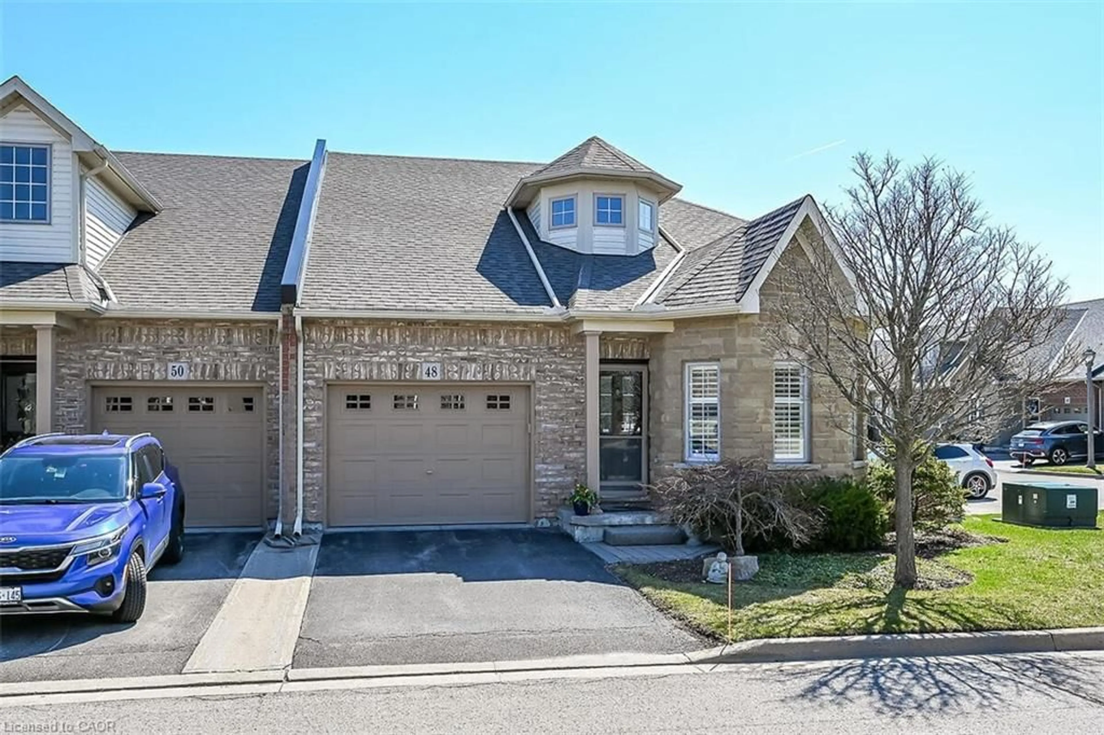 Home with brick exterior material, street for 48 Hallmark Trail, Hamilton Ontario L9B 0B8