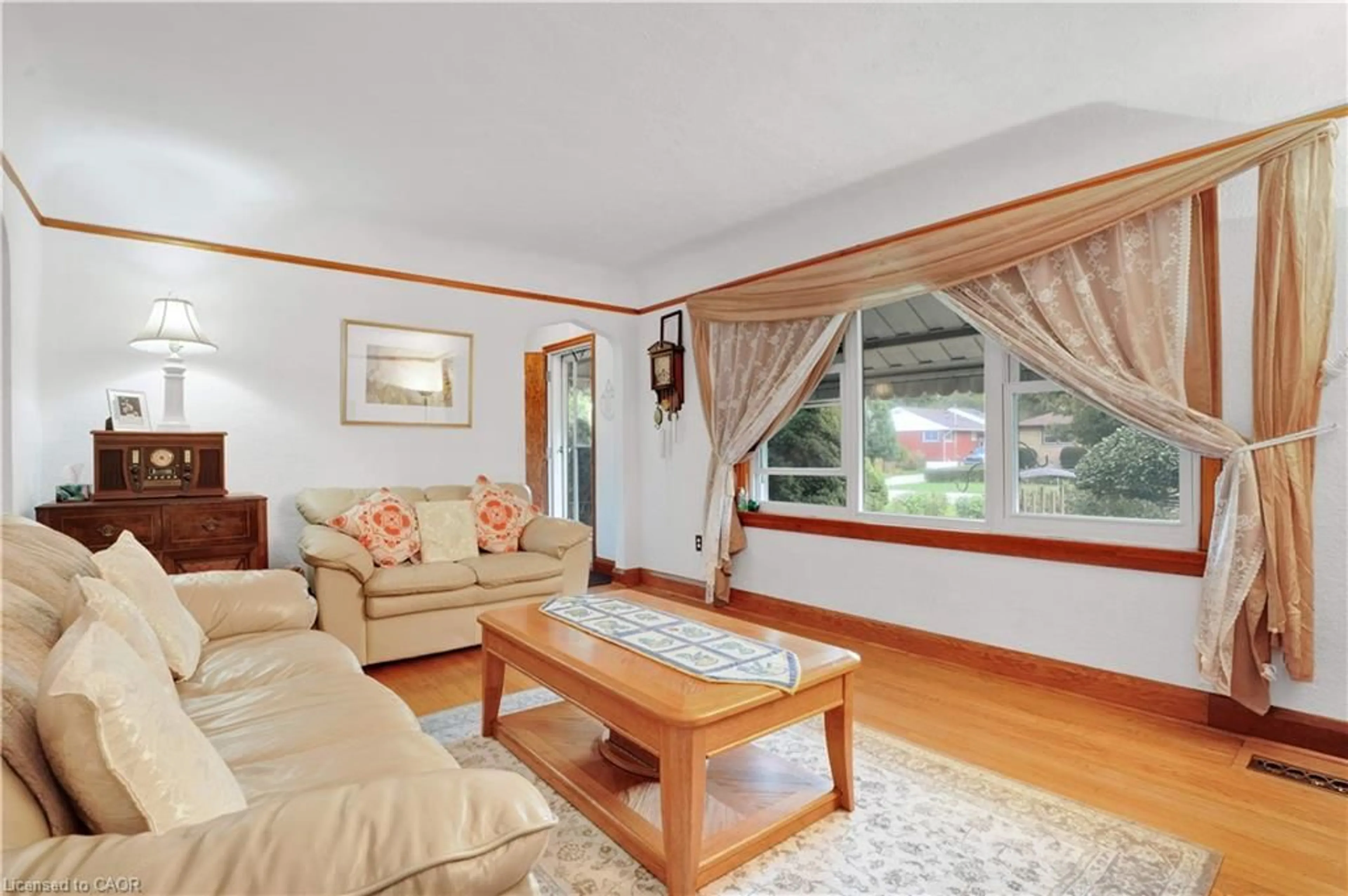 Living room with furniture, wood/laminate floor for 22 Graber Pl, Kitchener Ontario N2A 1G8