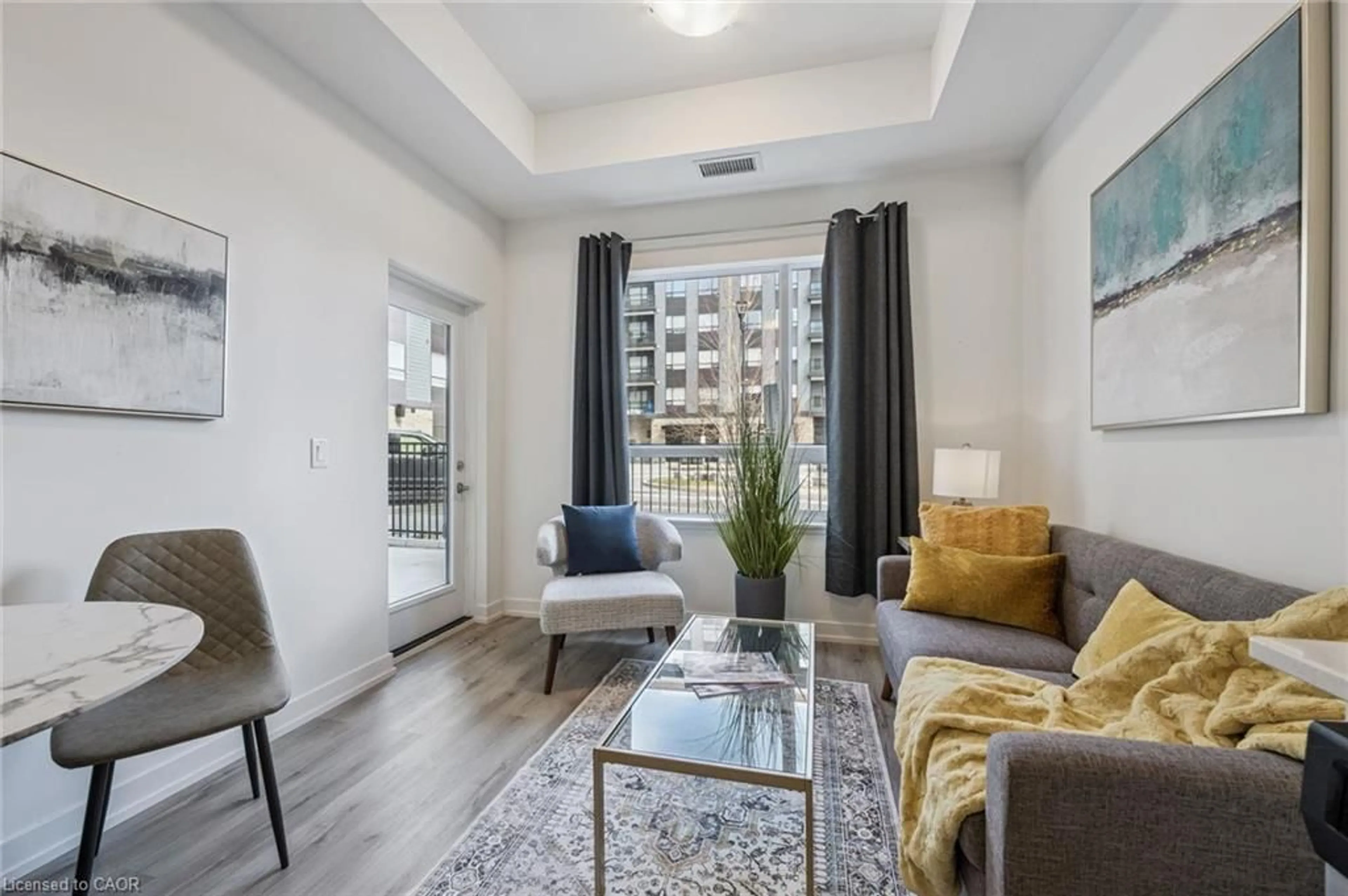 Living room with furniture, unknown for 251 Northfield Dr #105, Waterloo Ontario N2K 3H4