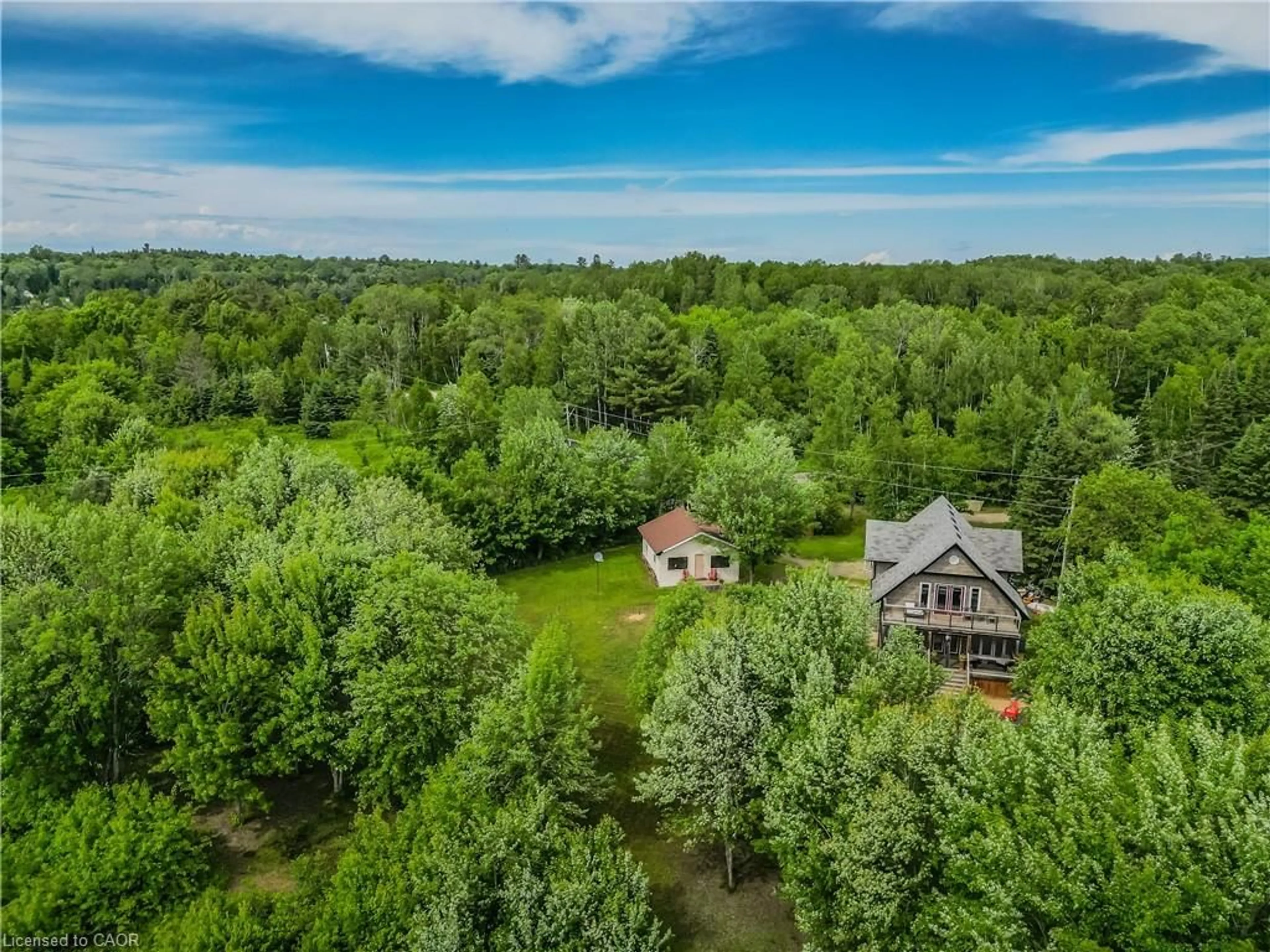 A pic from outside/outdoor area/front of a property/back of a property/a pic from drone, water/lake/river/ocean view for 5 Bridge Rd, Magnetawan Ontario P0A 1P0