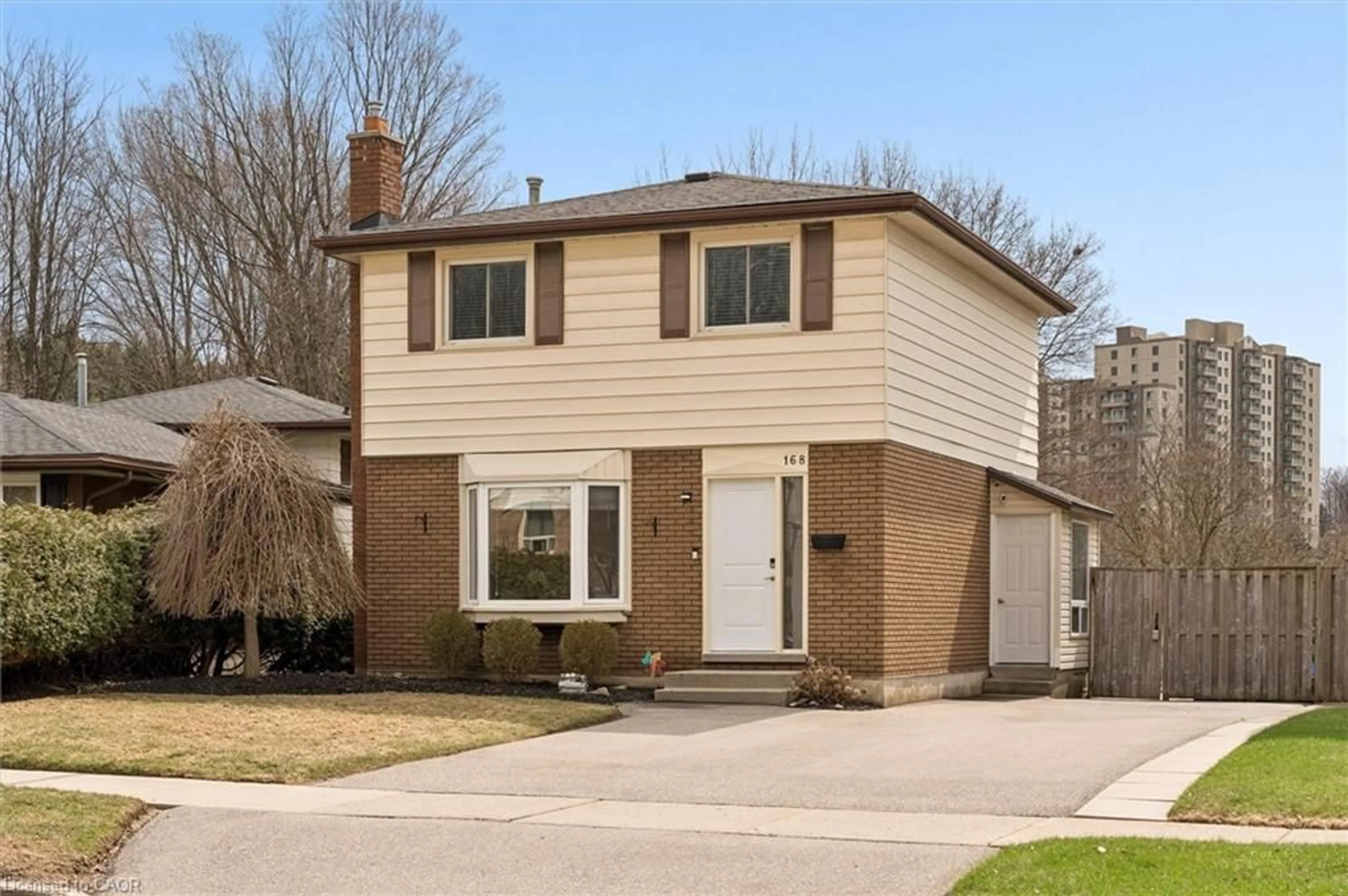 Home with brick exterior material, street for 168 Green Valley Dr, Kitchener Ontario N2P 1C4