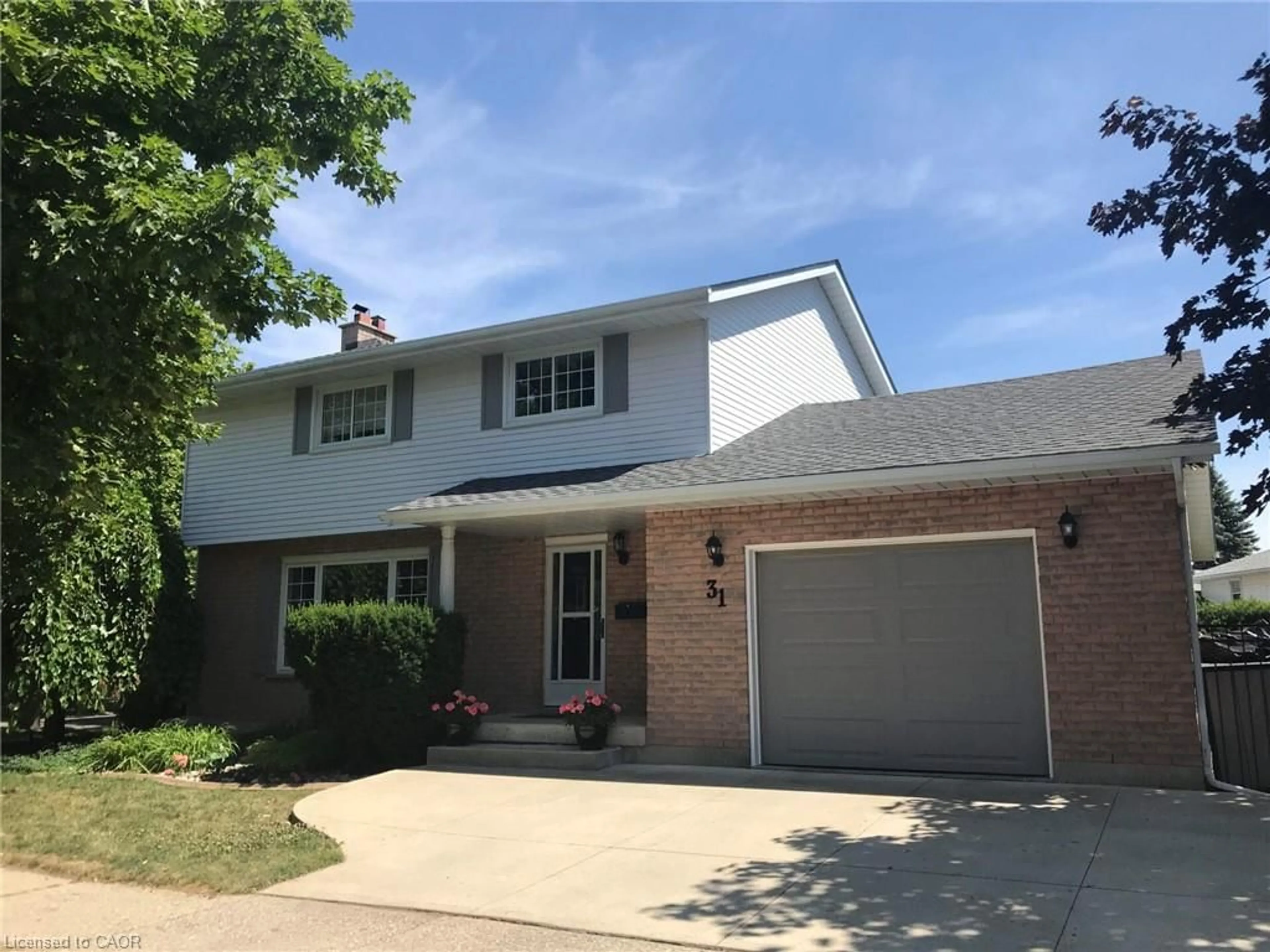 Home with vinyl exterior material, street for 31 Blackfriar Lane, Brantford Ontario N3R 7M2