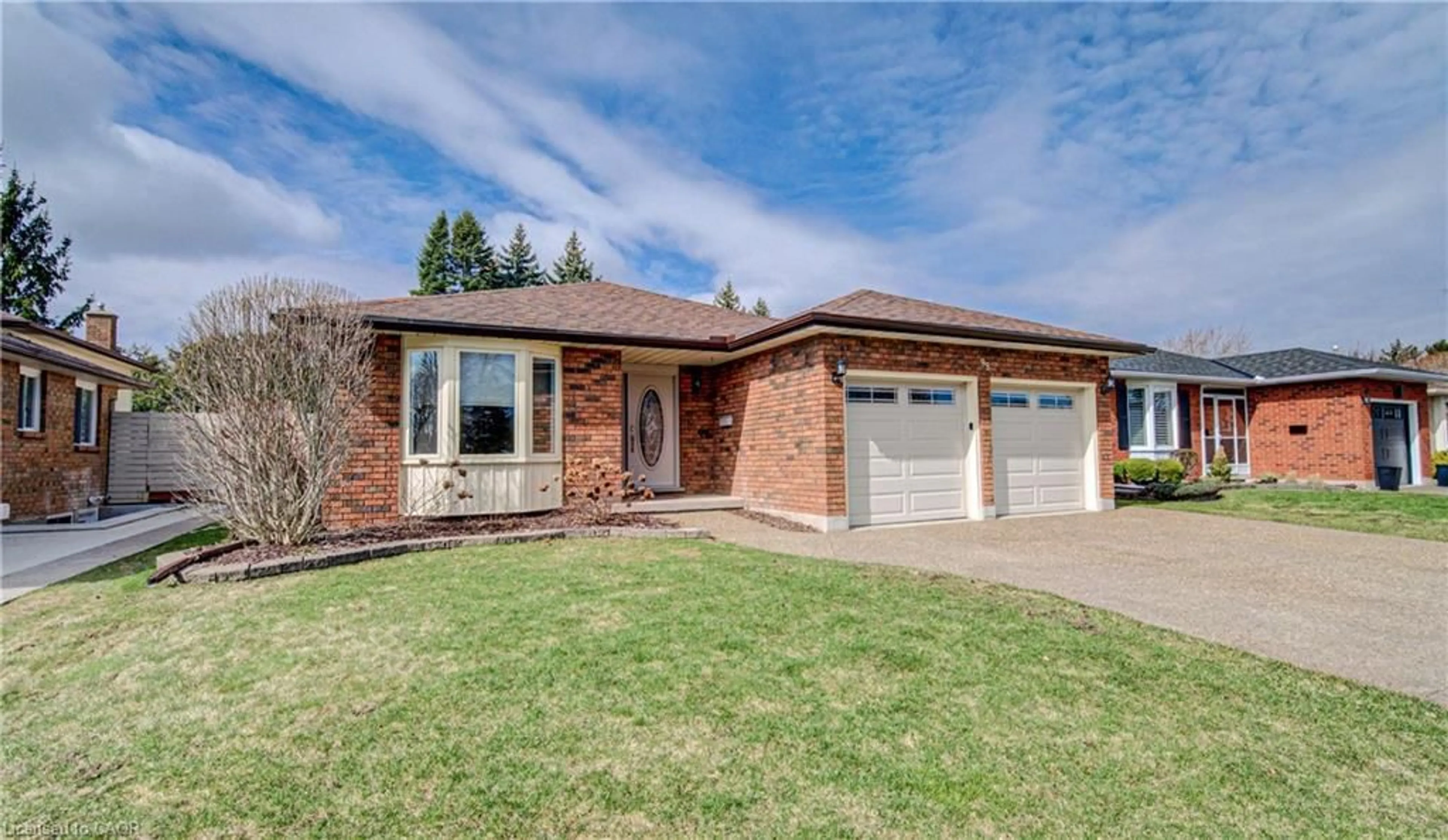 Home with brick exterior material, street for 95 Brierdale Dr, Kitchener Ontario N2A 3R5