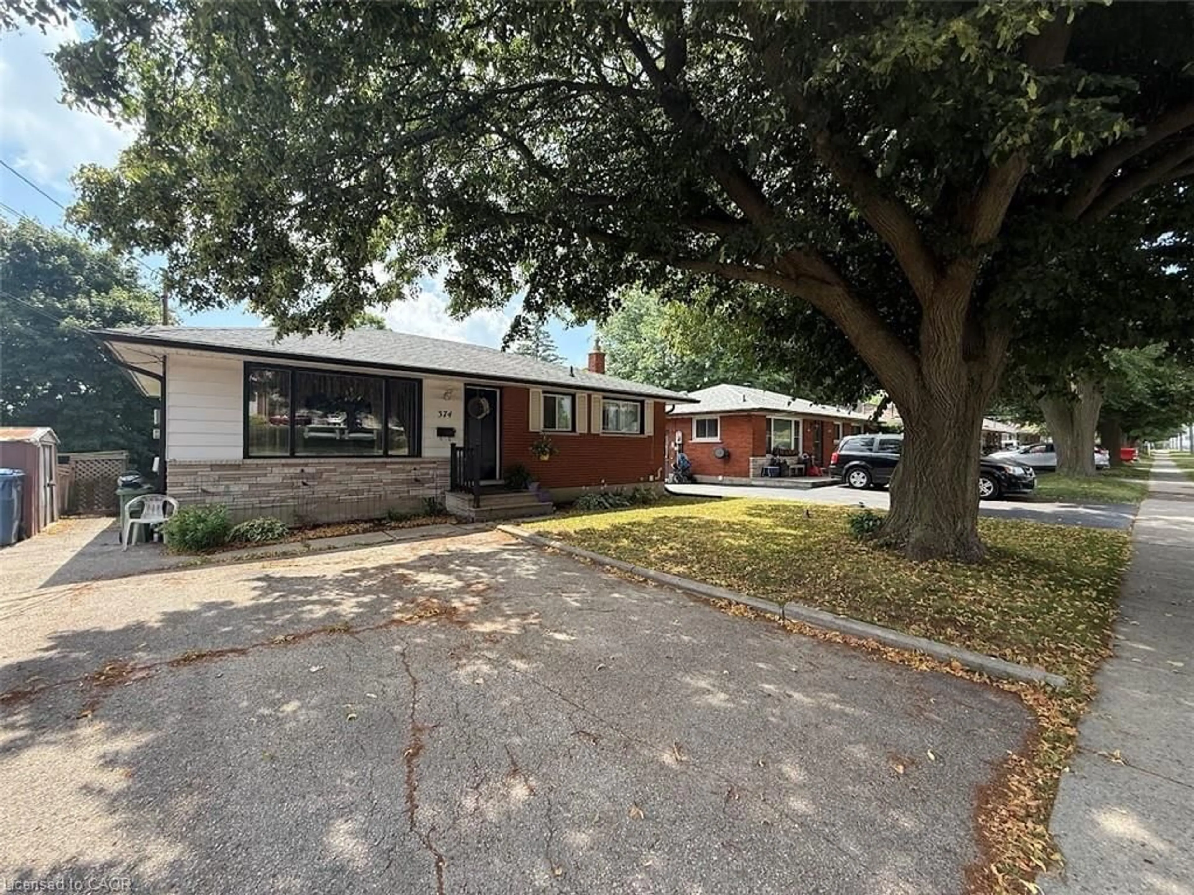 A pic from outside/outdoor area/front of a property/back of a property/a pic from drone, street for 374 Victoria Rd, Guelph Ontario N1E 5J7