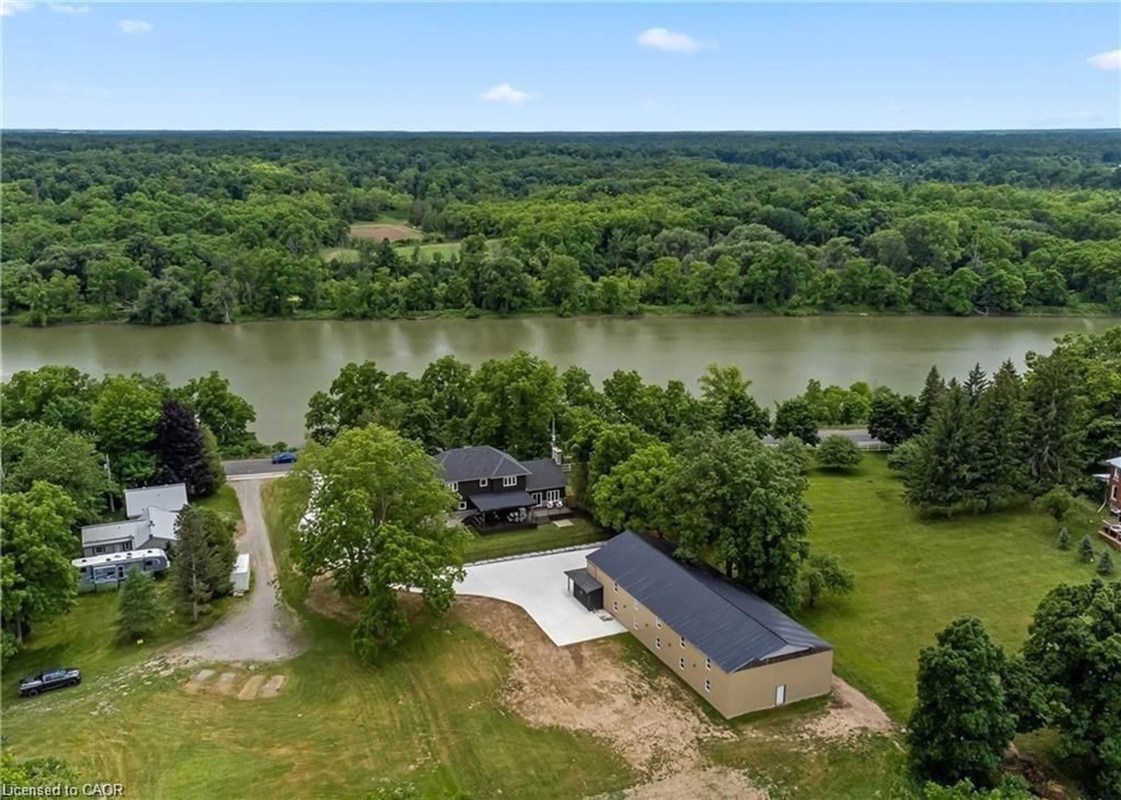 A pic from outside/outdoor area/front of a property/back of a property/a pic from drone, water/lake/river/ocean view for 2210 Highway 54, Caledonia Ontario N3W 1Y4