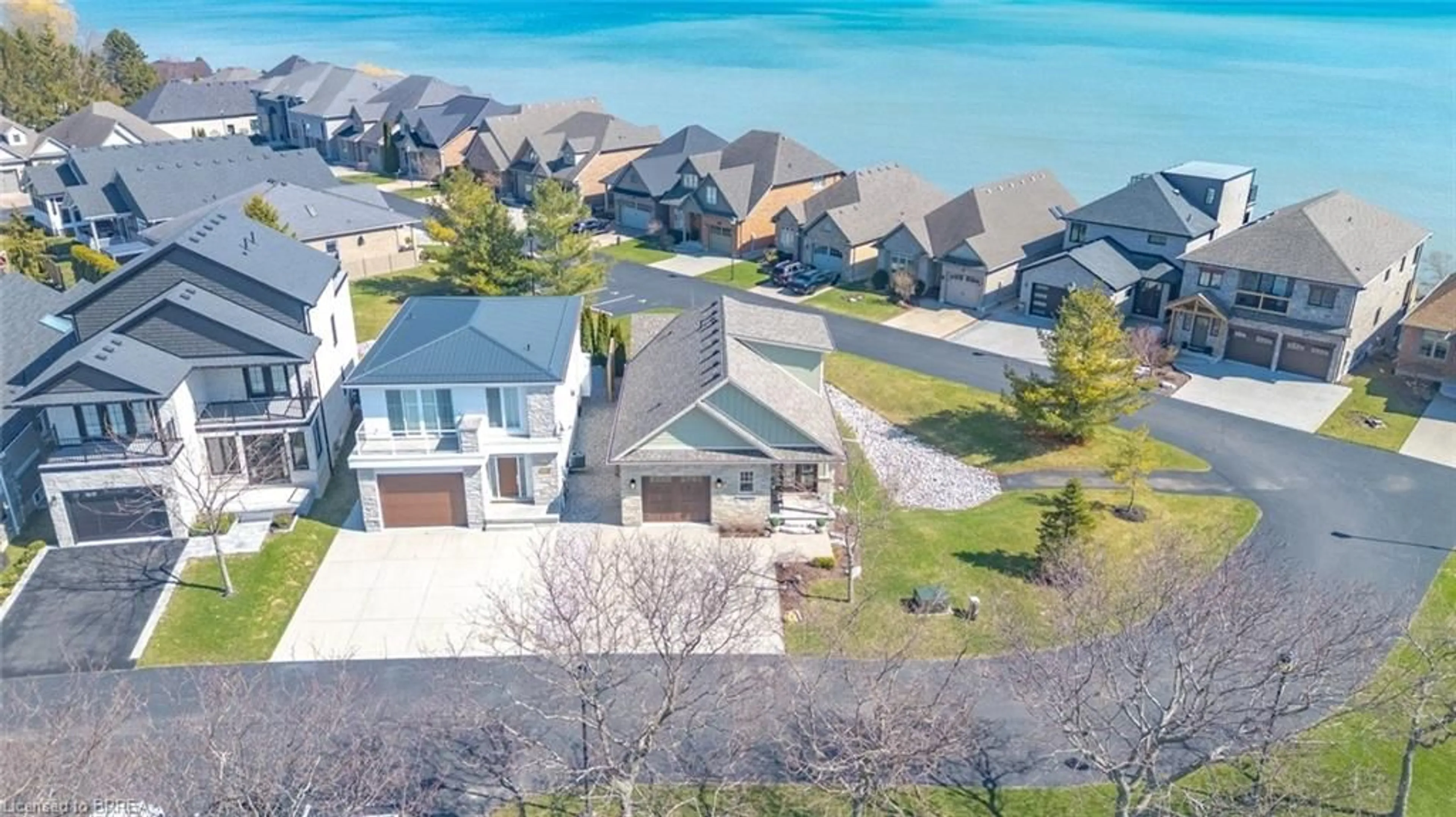 A pic from outside/outdoor area/front of a property/back of a property/a pic from drone, water/lake/river/ocean view for 80 New Lakeshore Rd #20, Port Dover Ontario N0A 1N8