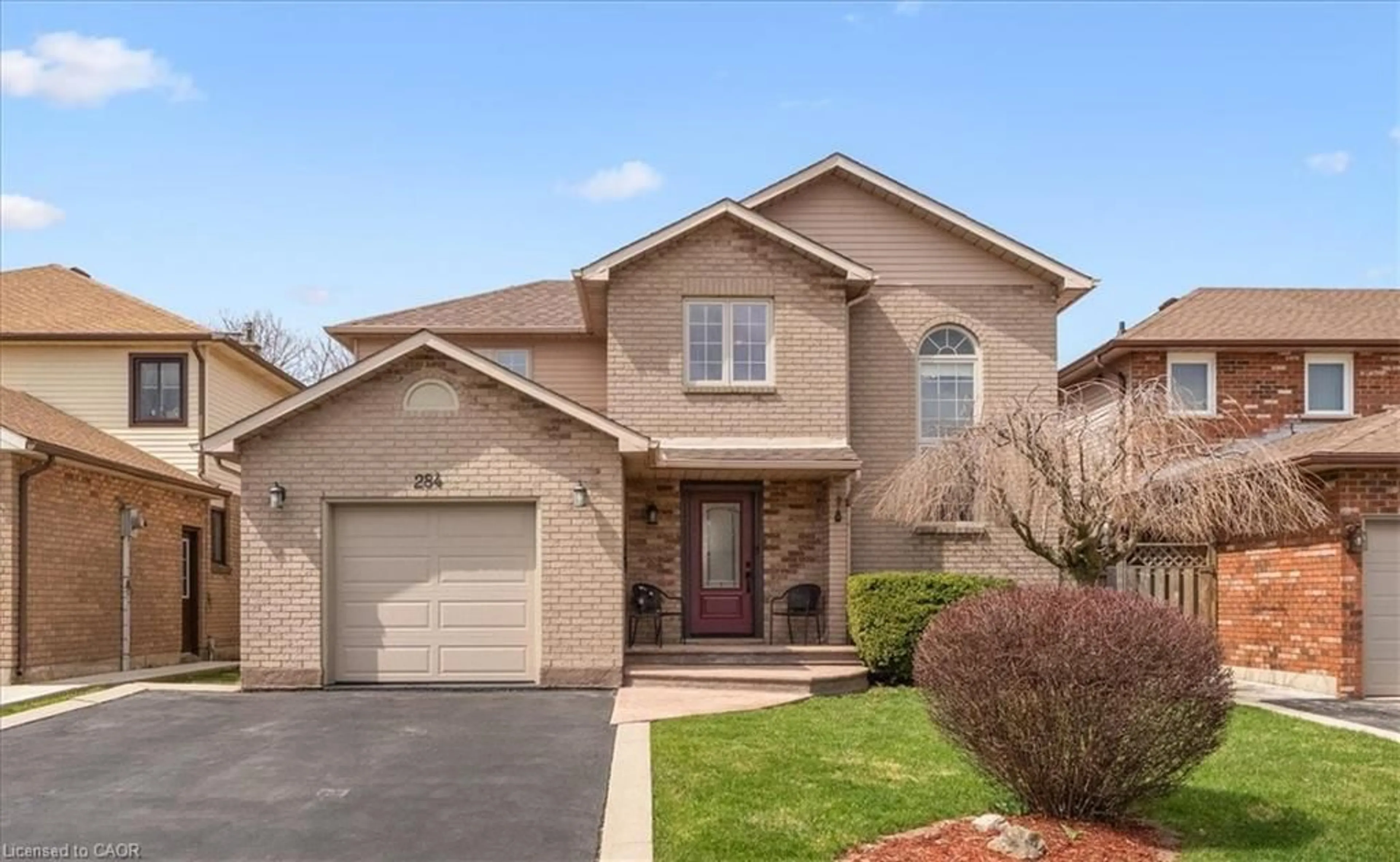 Home with brick exterior material, street for 284 Delancey Blvd, Hamilton Ontario L9B 1Y9