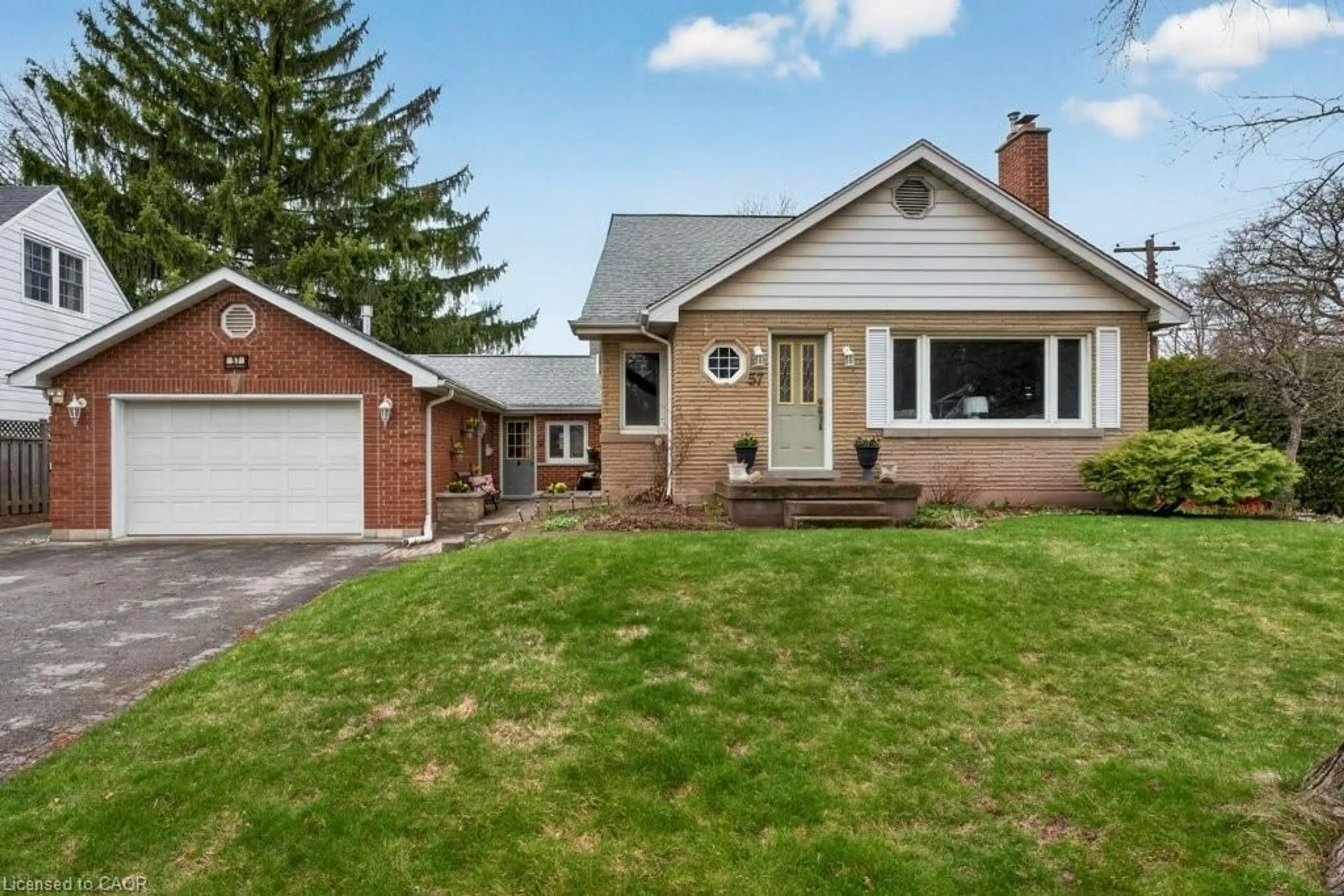 Home with brick exterior material, street for 57 Park Ave, Burlington Ontario L7T 1Y2