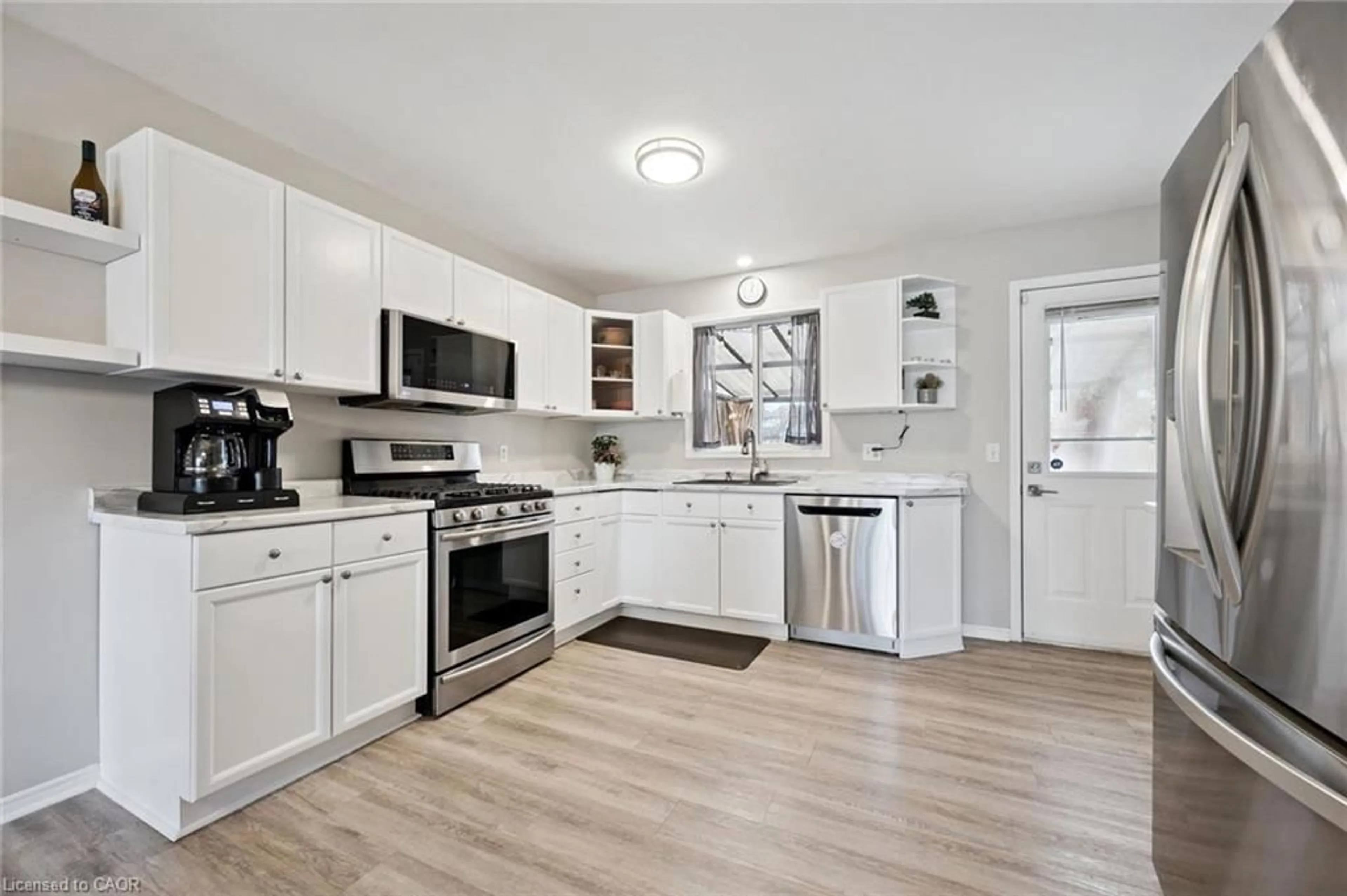 Open concept kitchen, ceramic/tile floor for 119 Meadowridge Dr, St. Marys Ontario N4X 1A6