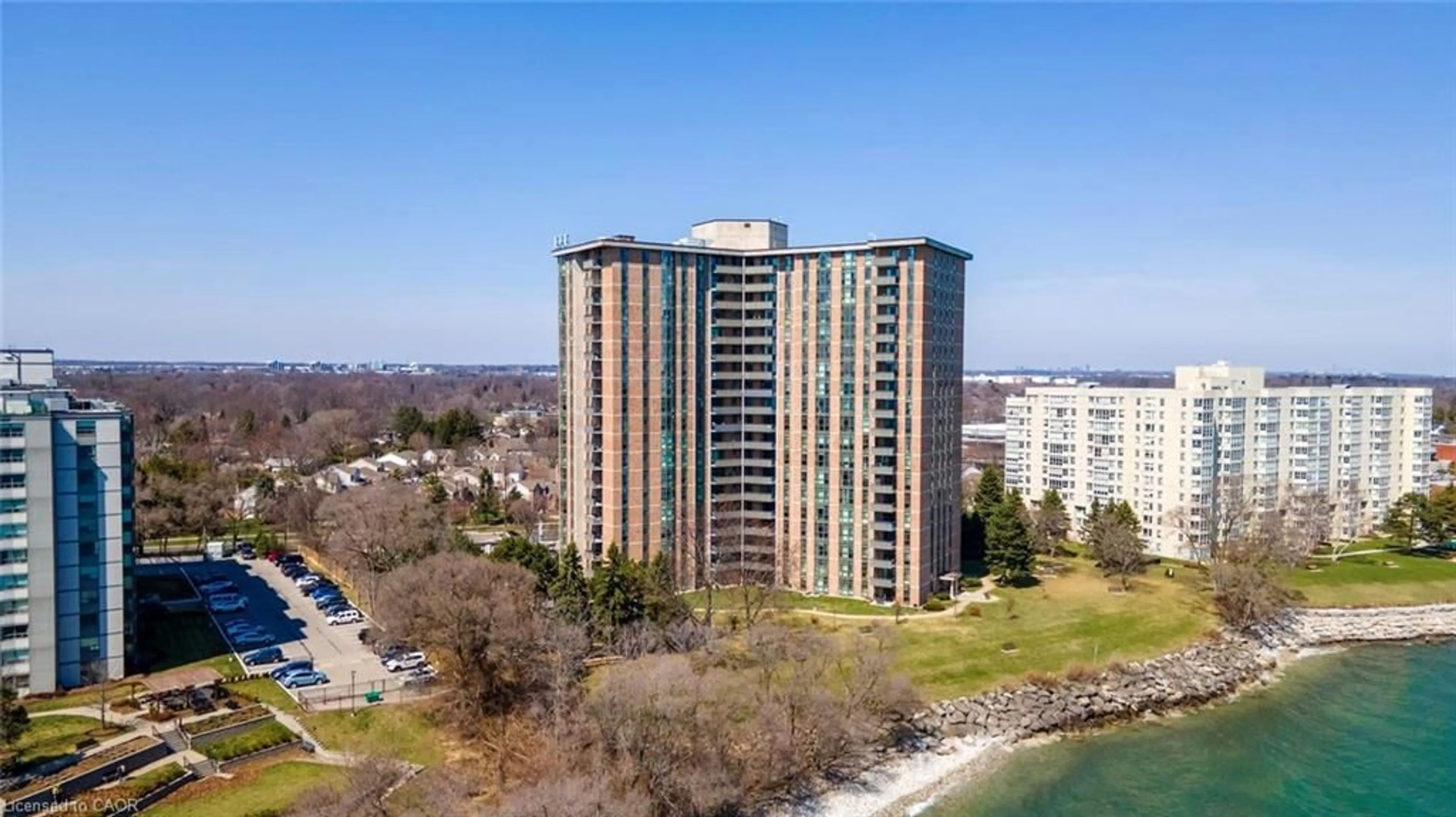 A pic from outside/outdoor area/front of a property/back of a property/a pic from drone, water/lake/river/ocean view for 5250 Lakeshore Rd #1006, Burlington Ontario L7L 5L2