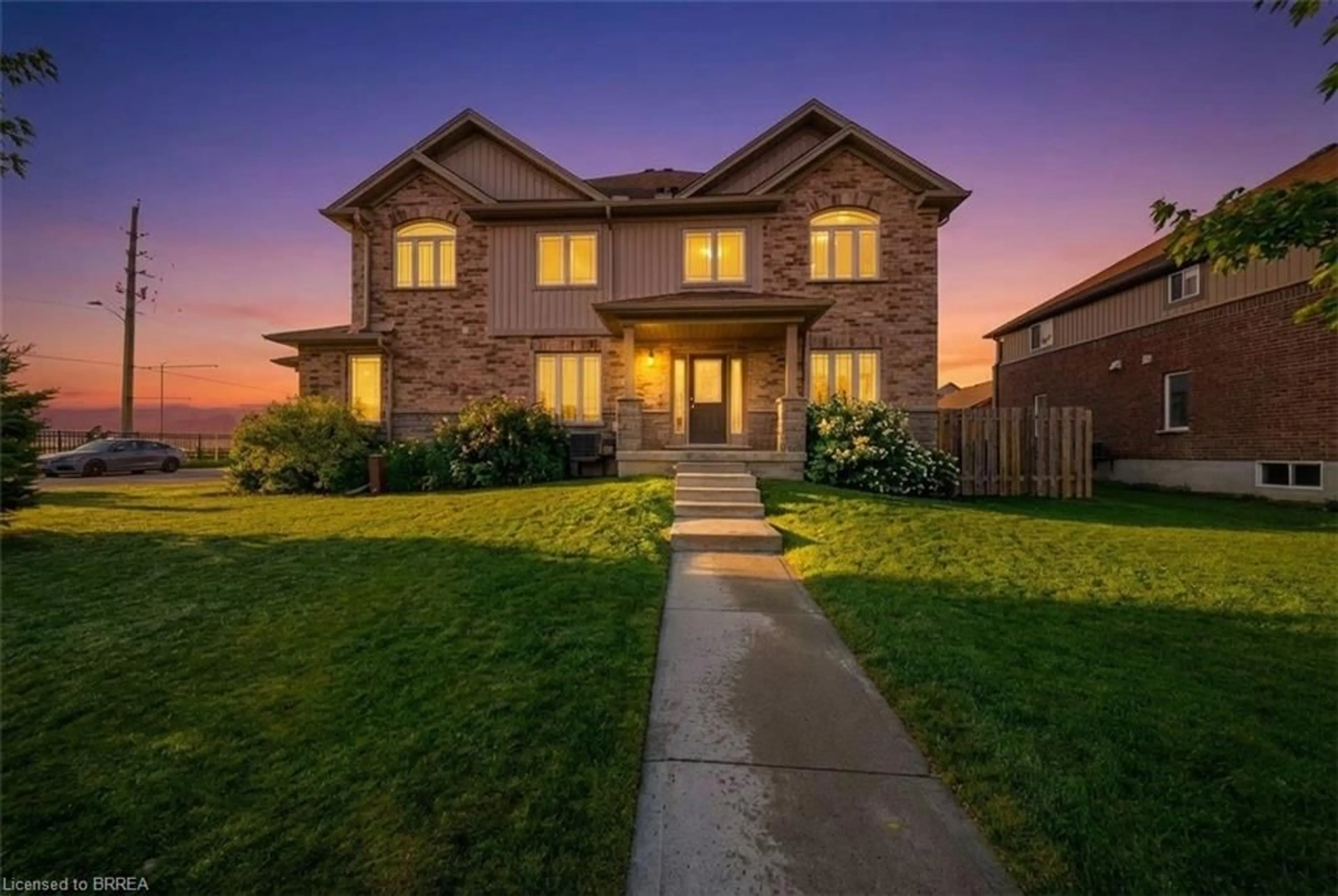 Home with brick exterior material, street for 1220 Riverbend Rd #105, London Ontario N6K 0G5