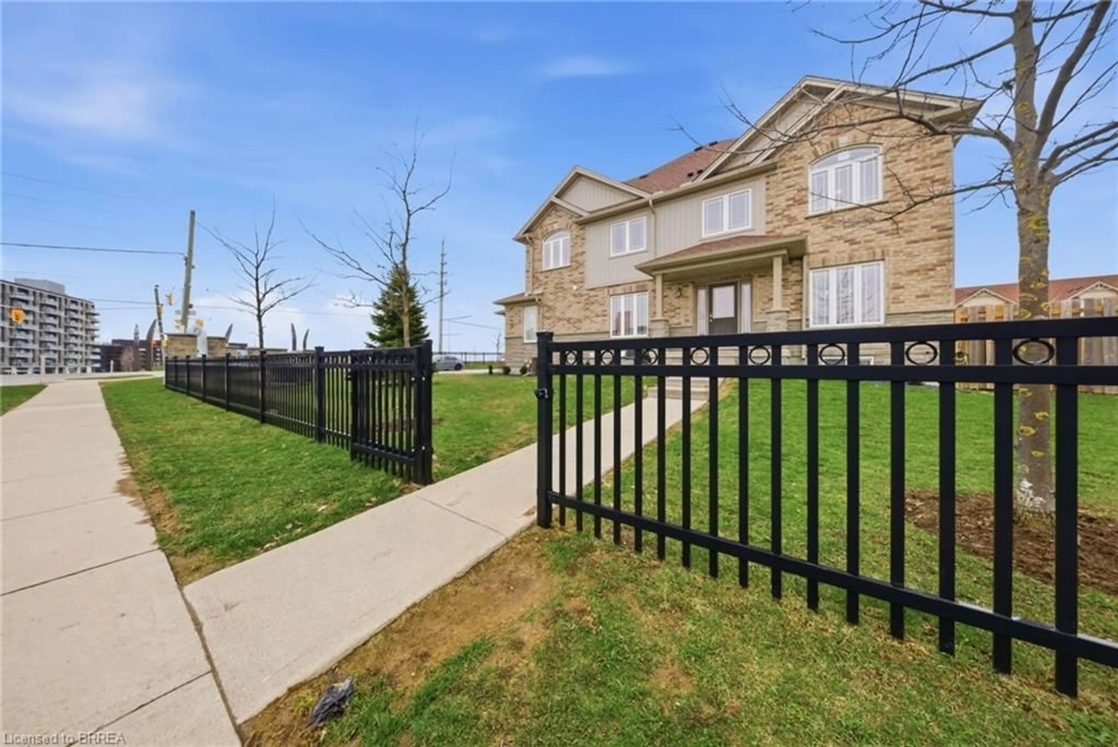 Home with brick exterior material, street for 1220 Riverbend Rd #105, London Ontario N6K 0G5