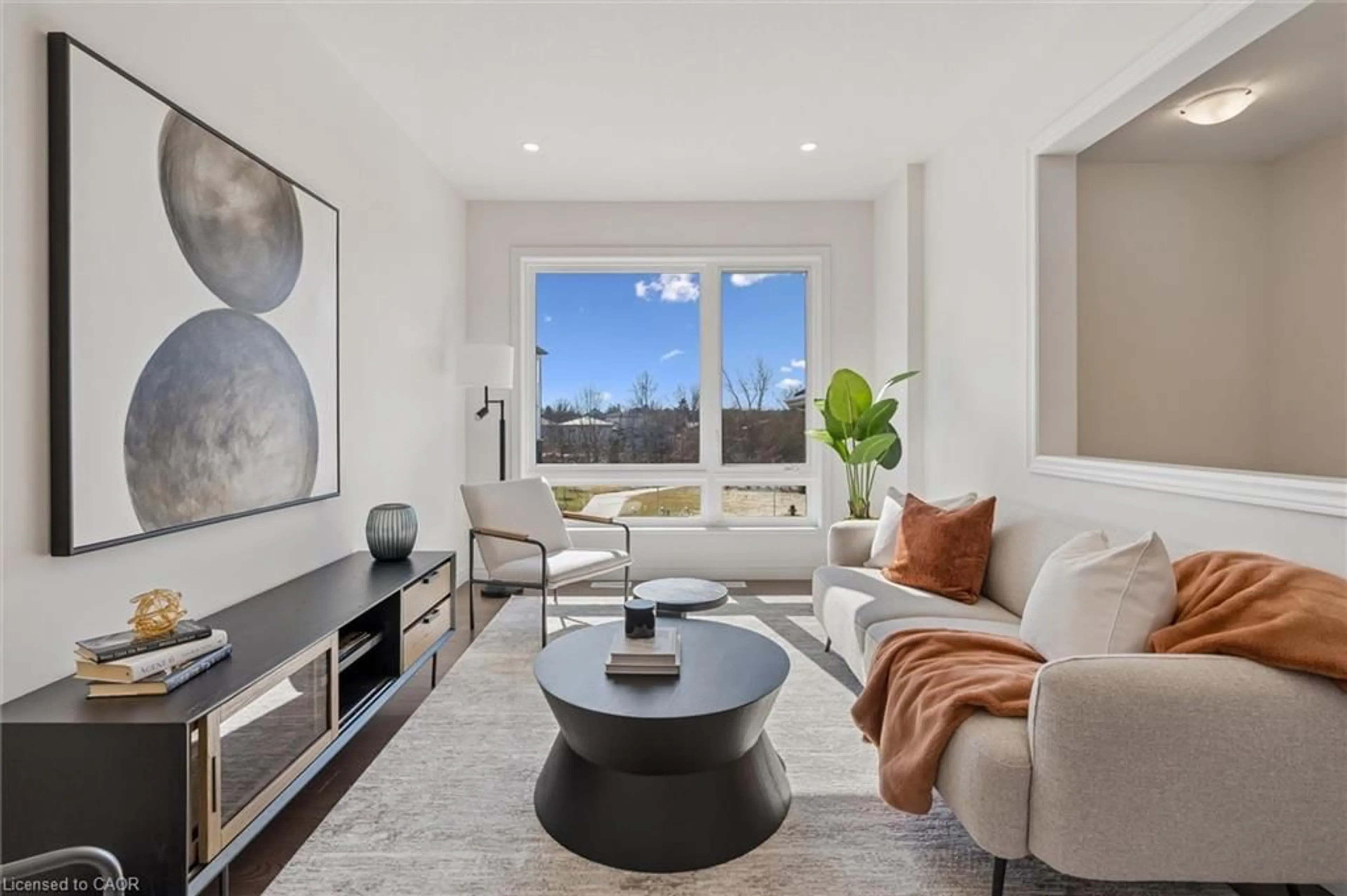 Living room with furniture, unknown for 21 Sora Lane, Guelph Ontario N1E 0T4