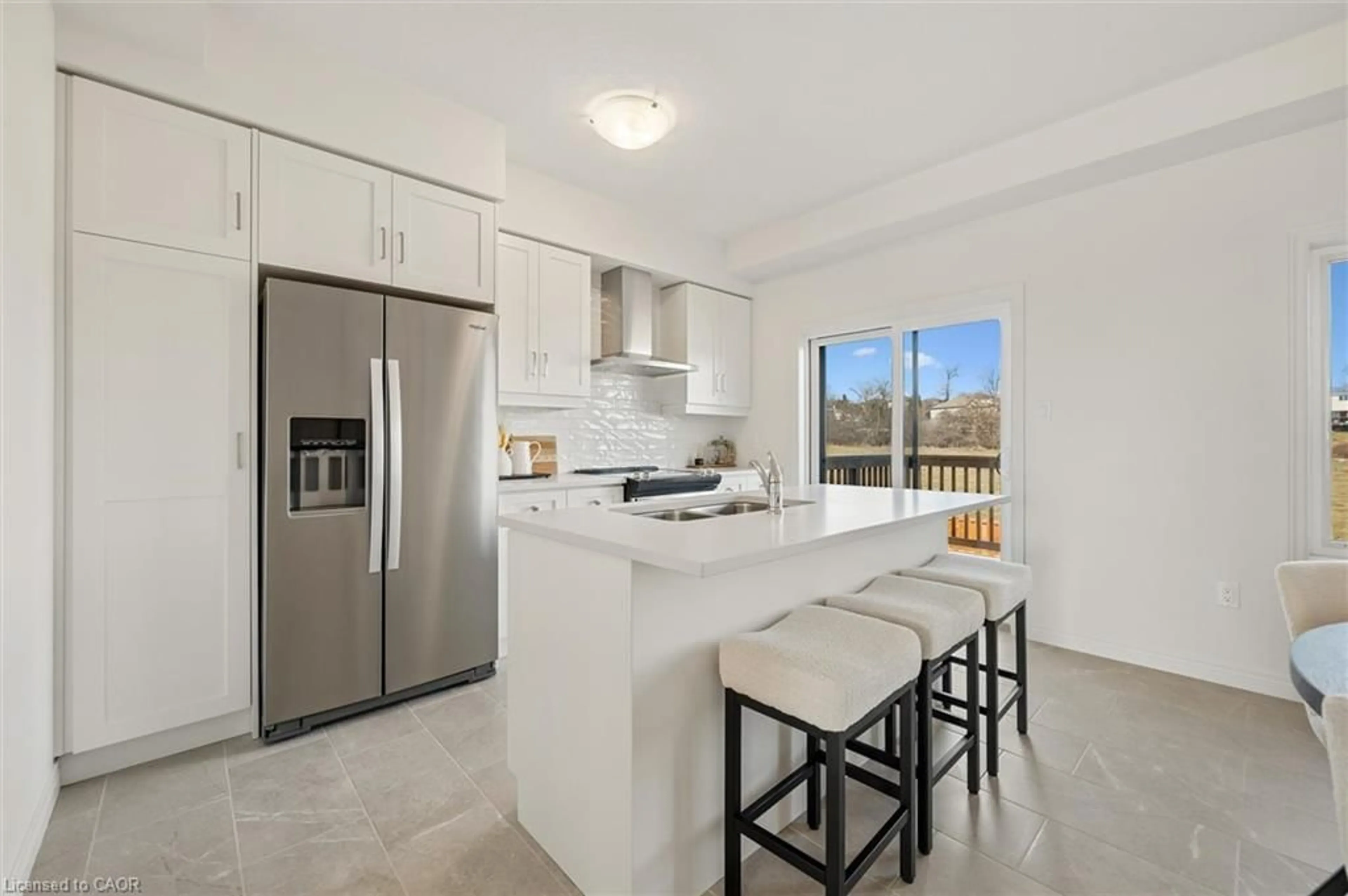 Open concept kitchen, ceramic/tile floor for 21 Sora Lane, Guelph Ontario N1E 0T4