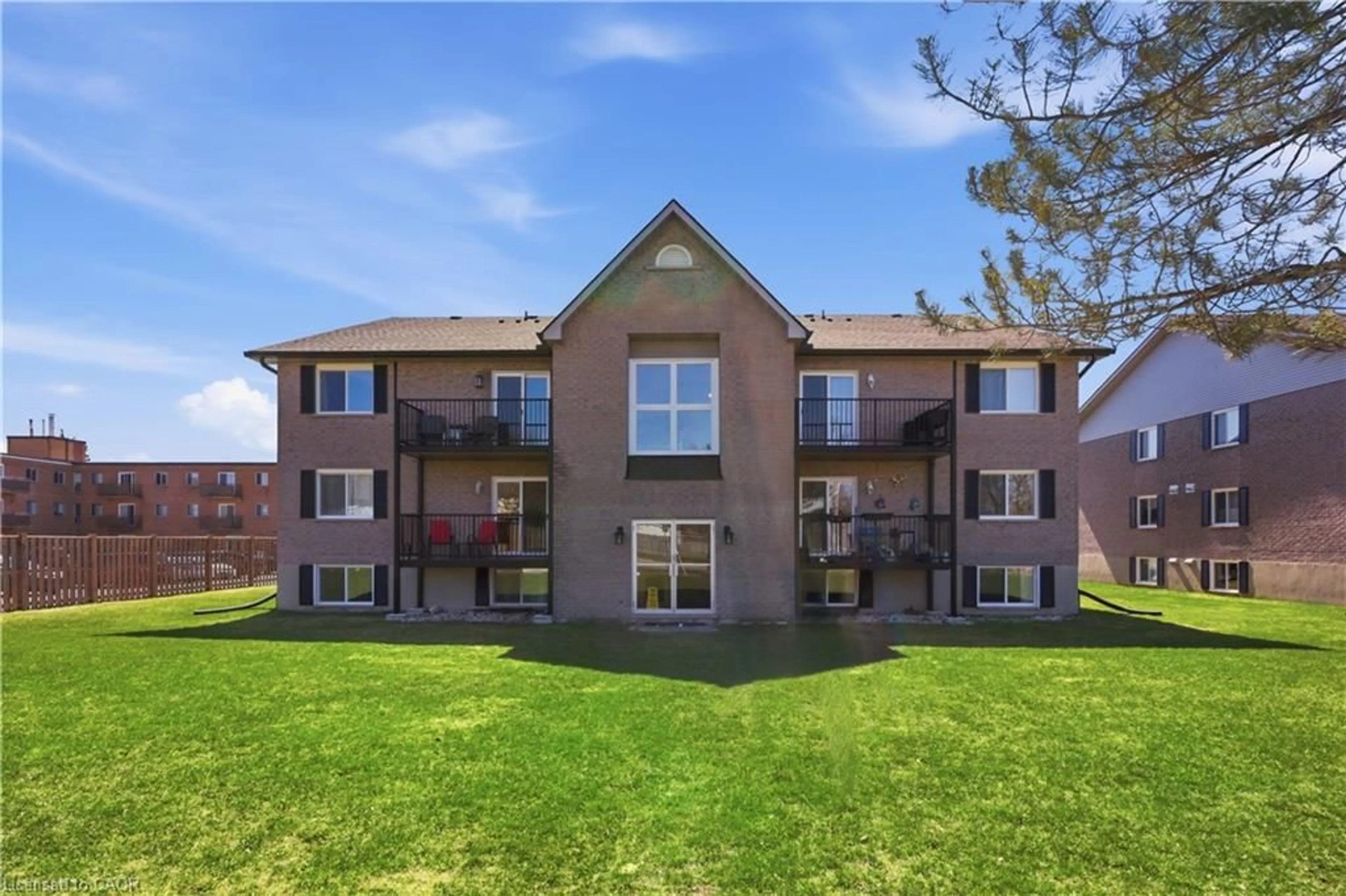 A pic from outside/outdoor area/front of a property/back of a property/a pic from drone, unknown for 50 Campbell Crt #312, Stratford Ontario N5A 7T6