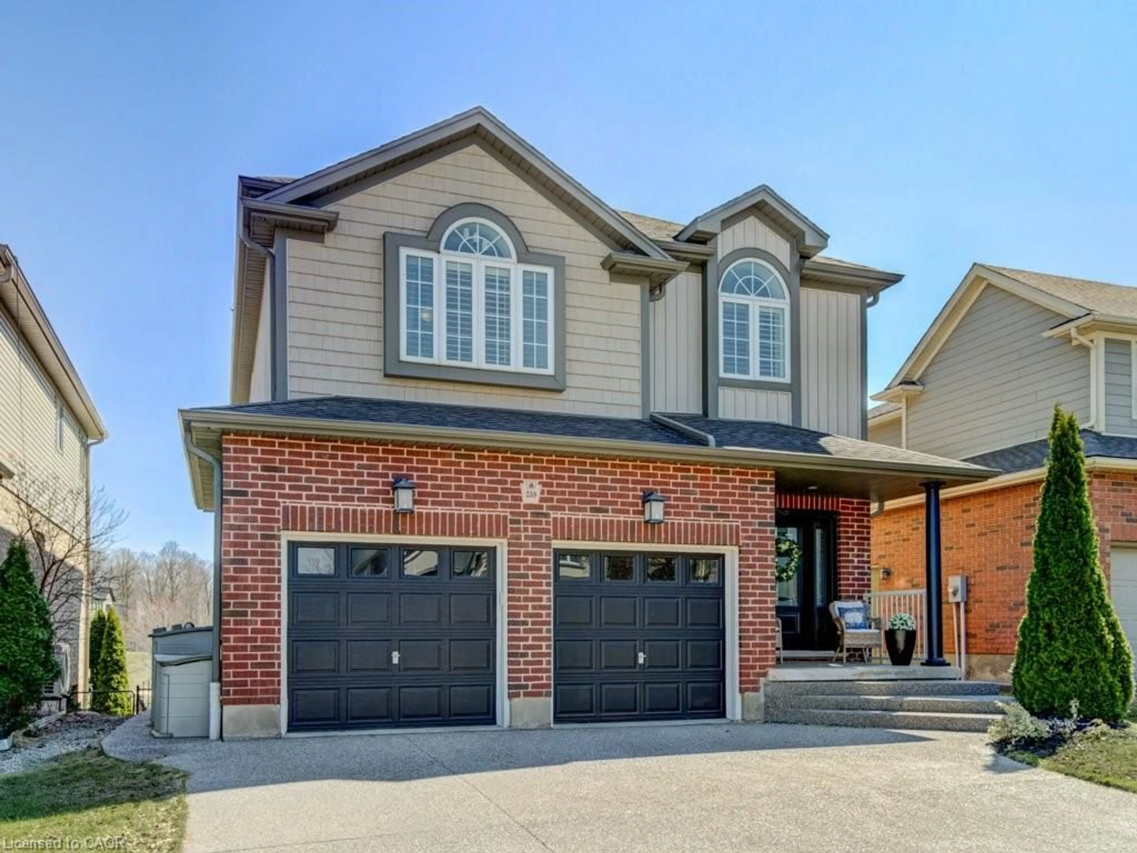 Home with brick exterior material, street for 259 Zeller Dr, Kitchener Ontario N2A 0B2