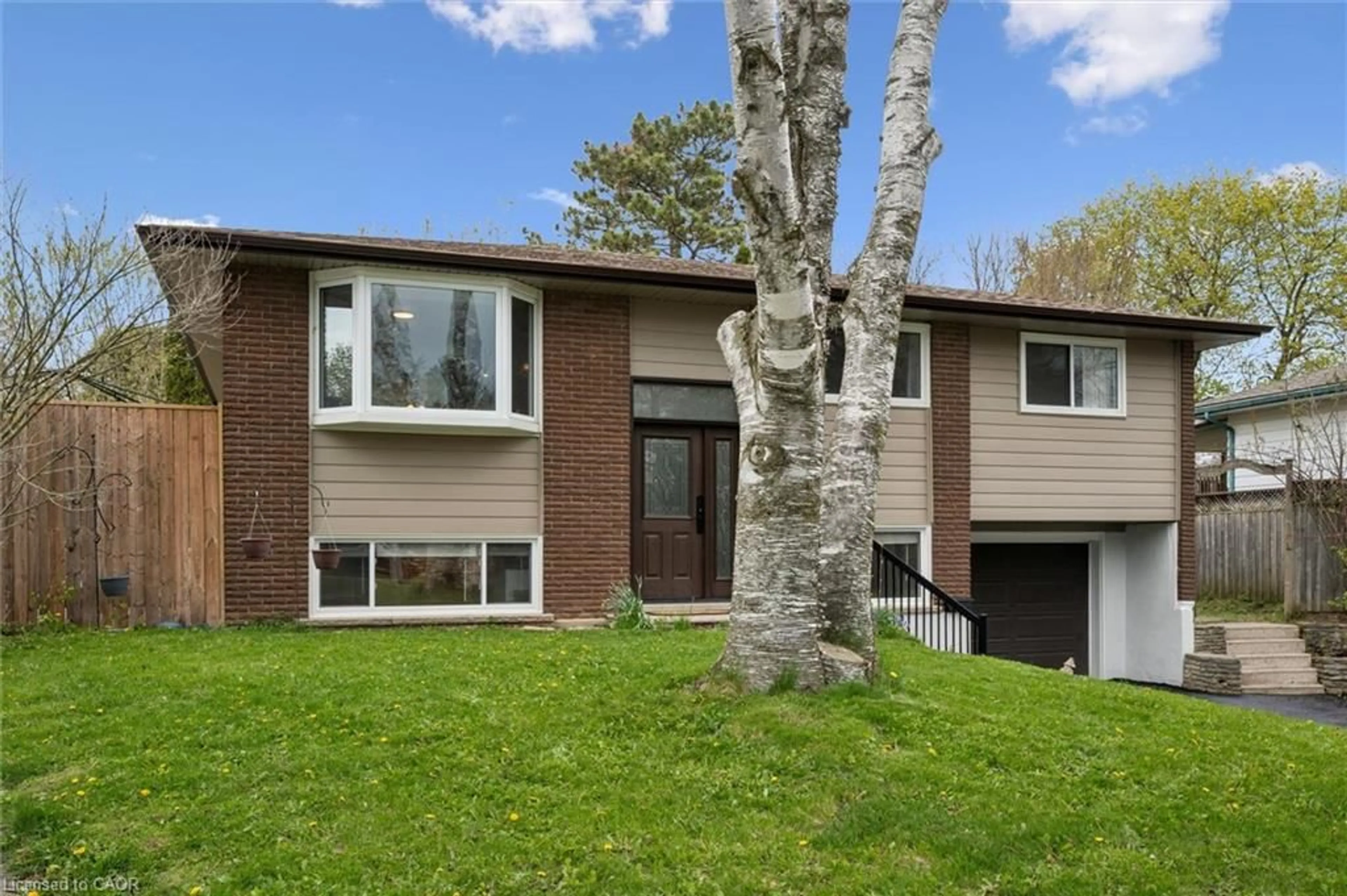 Home with vinyl exterior material, street for 176 Woodville Pl, Waterloo Ontario N2L 4W9
