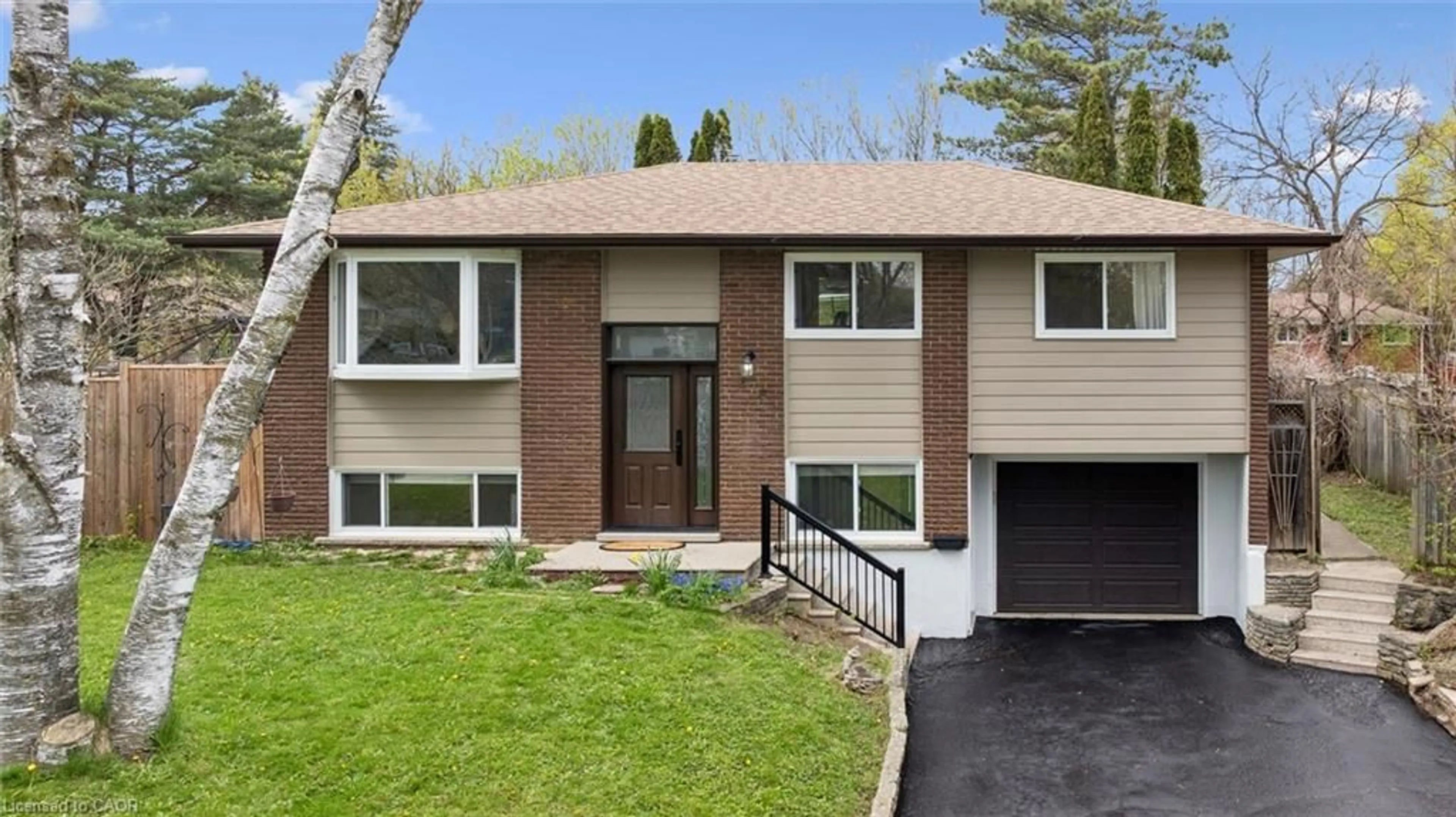 Home with vinyl exterior material, street for 176 Woodville Pl, Waterloo Ontario N2L 4W9