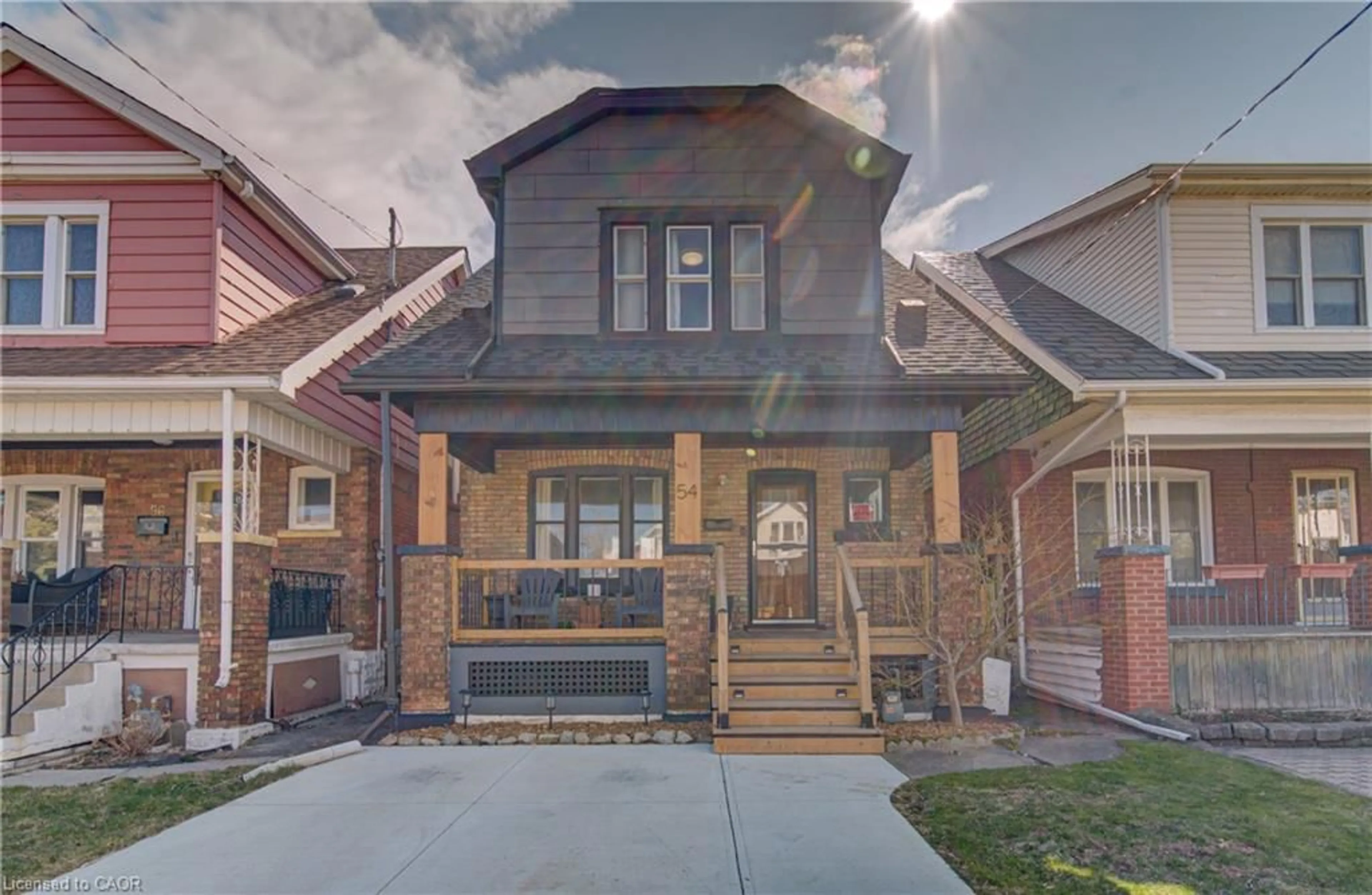 Home with brick exterior material, street for 54 Belmont Ave, Hamilton Ontario L8L 7M1