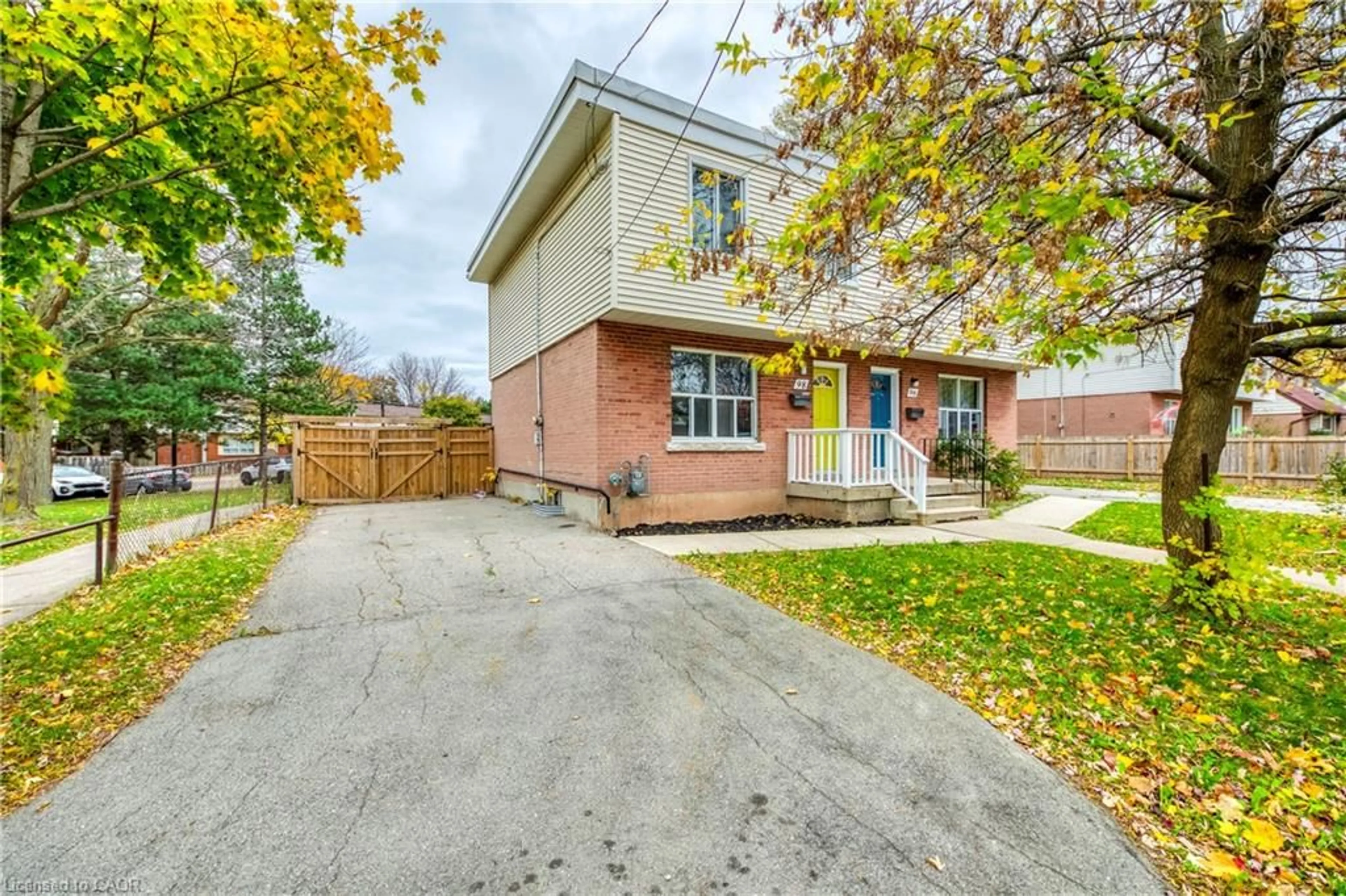 Home with brick exterior material, street for 98 Armstrong Ave, Hamilton Ontario L8H 1M5
