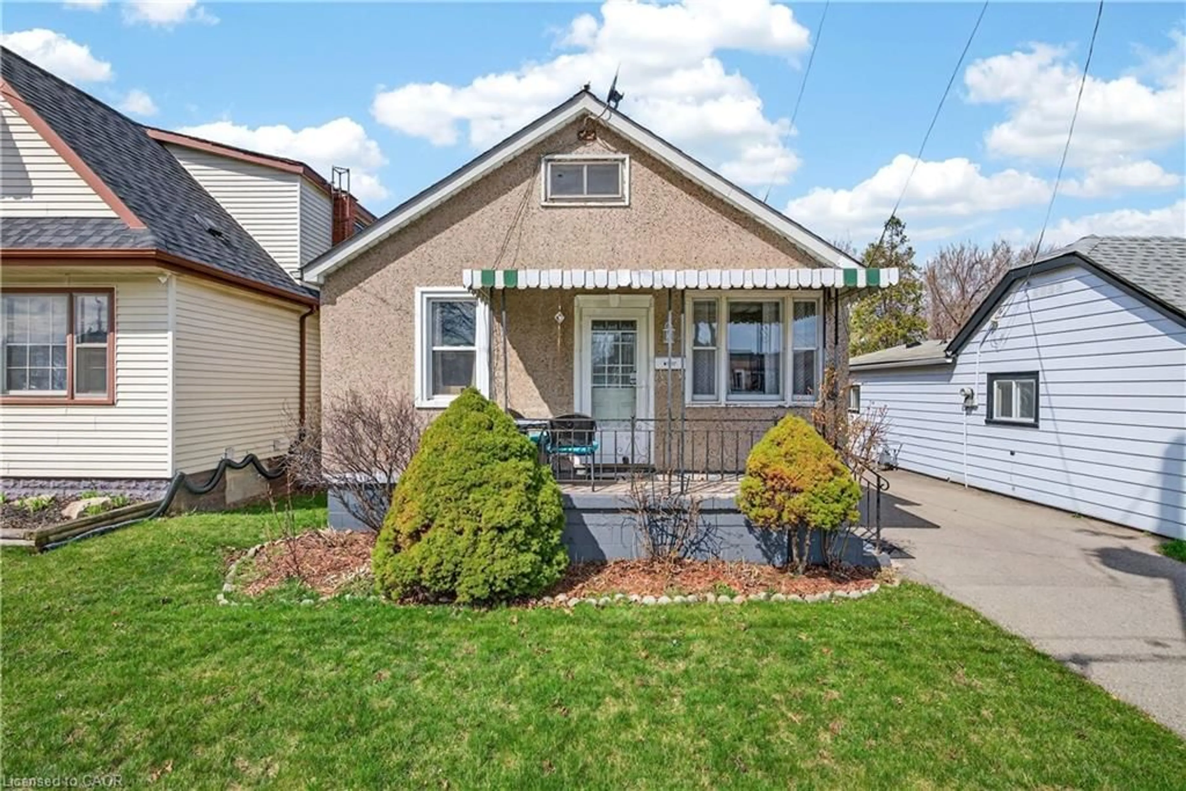 Home with vinyl exterior material, street for 663 Tate Ave, Hamilton Ontario L8H 6L5