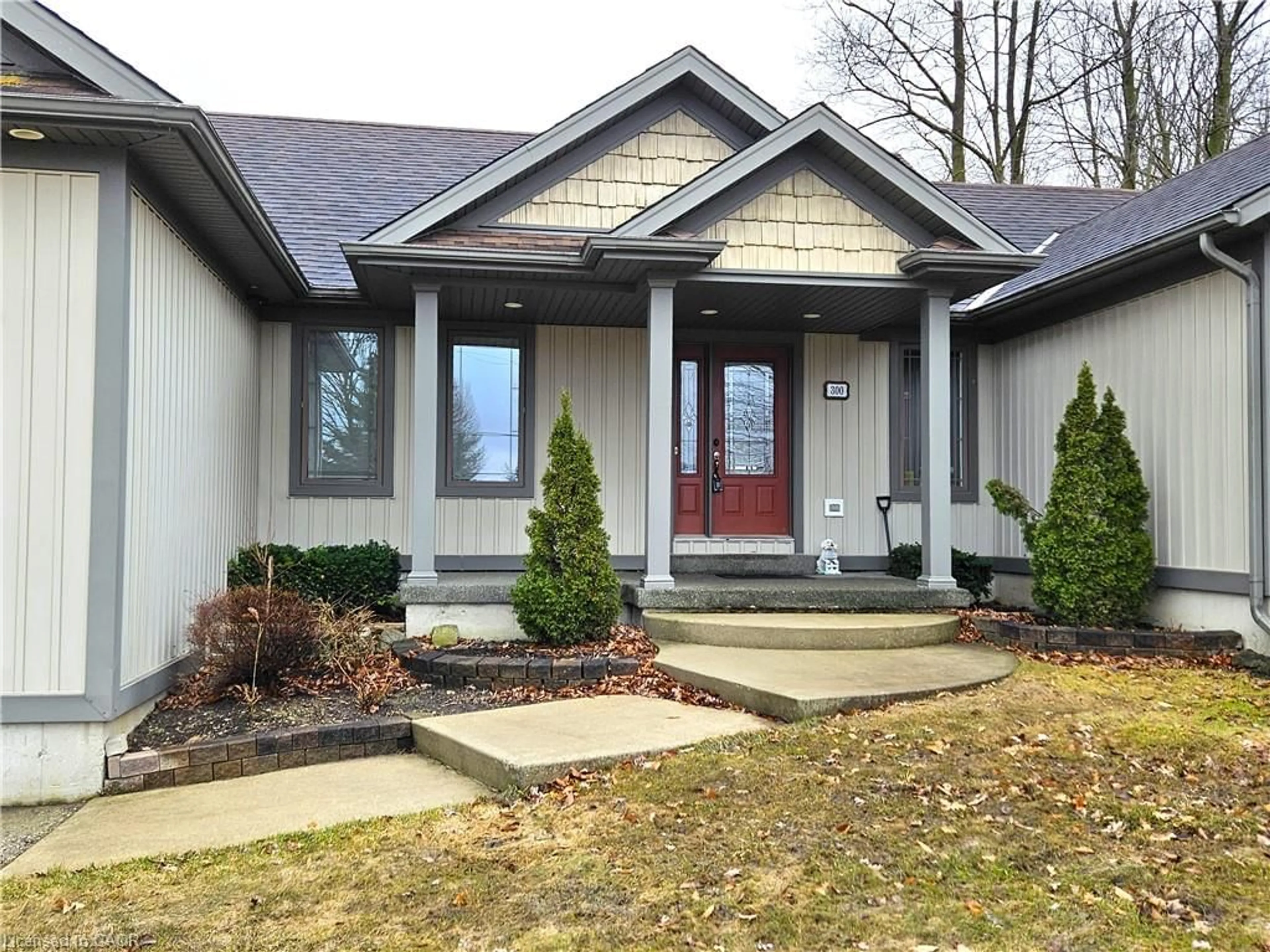 Home with vinyl exterior material, street for 300 Durham St, Mount Forest Ontario N0G 2L1