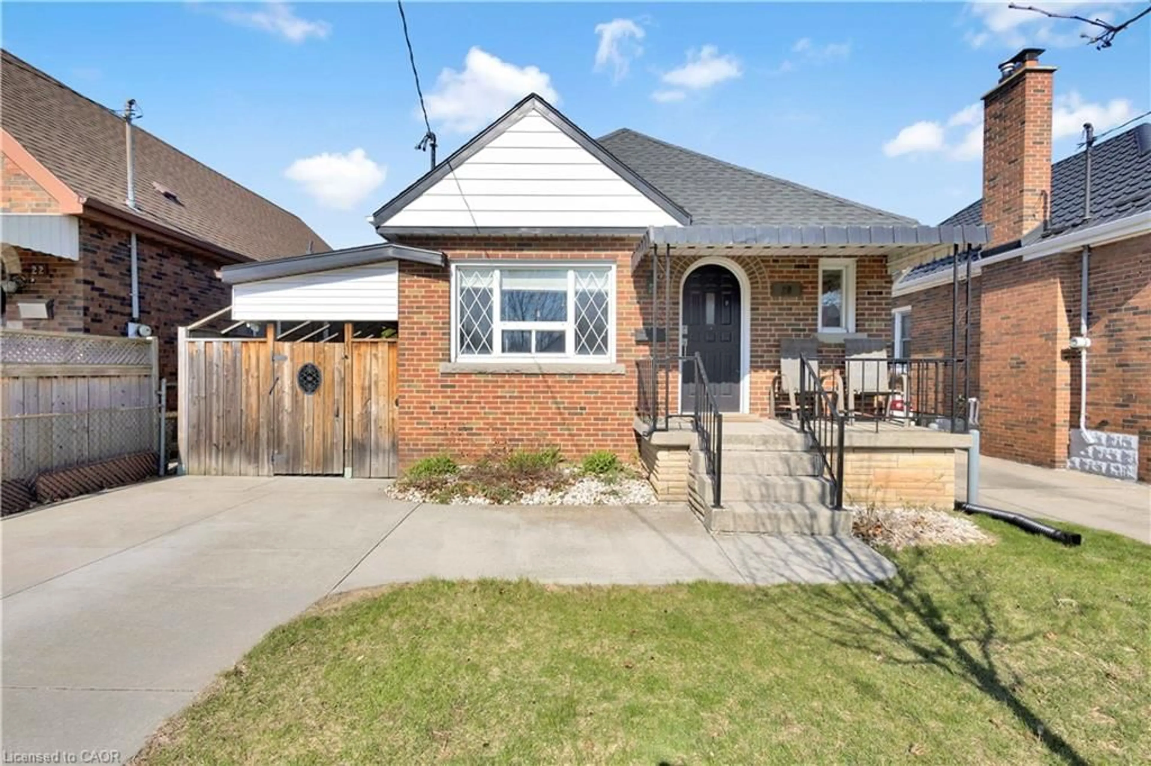 Home with brick exterior material, street for 20 Barons Ave, Hamilton Ontario L8K 2X9