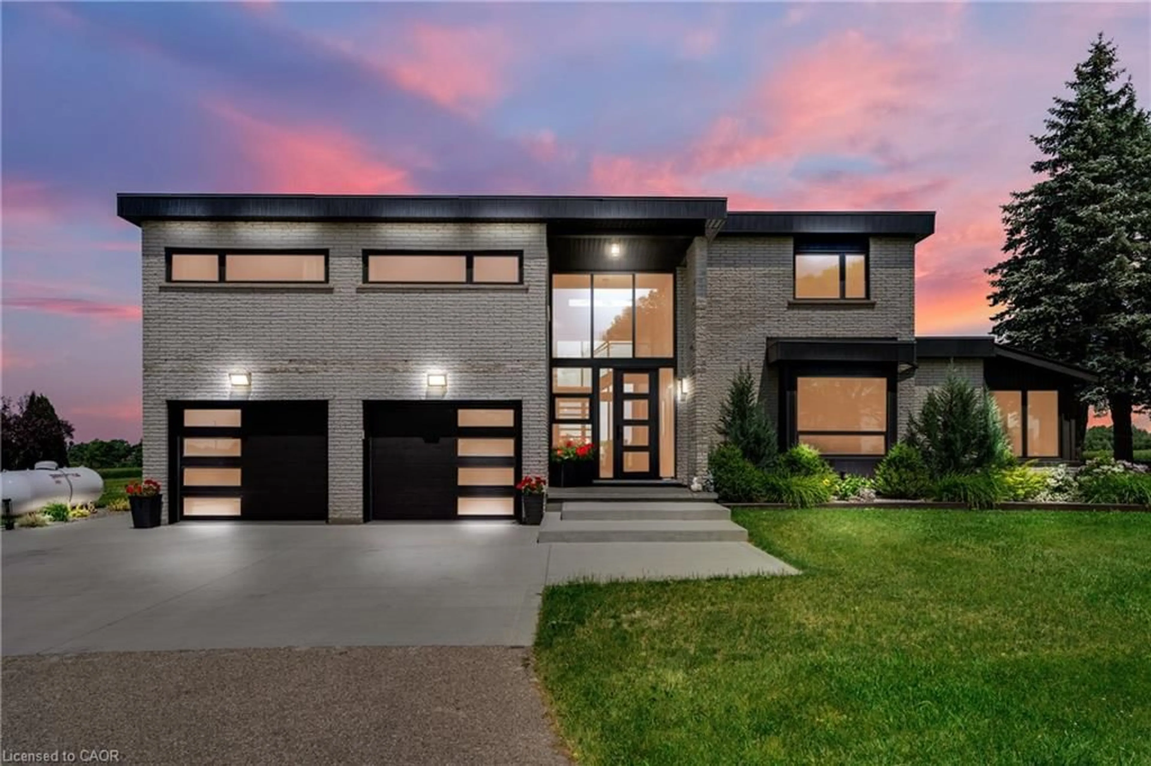 Home with brick exterior material, street for 8312 Wellington Road 124, Guelph Ontario N1H 6H7